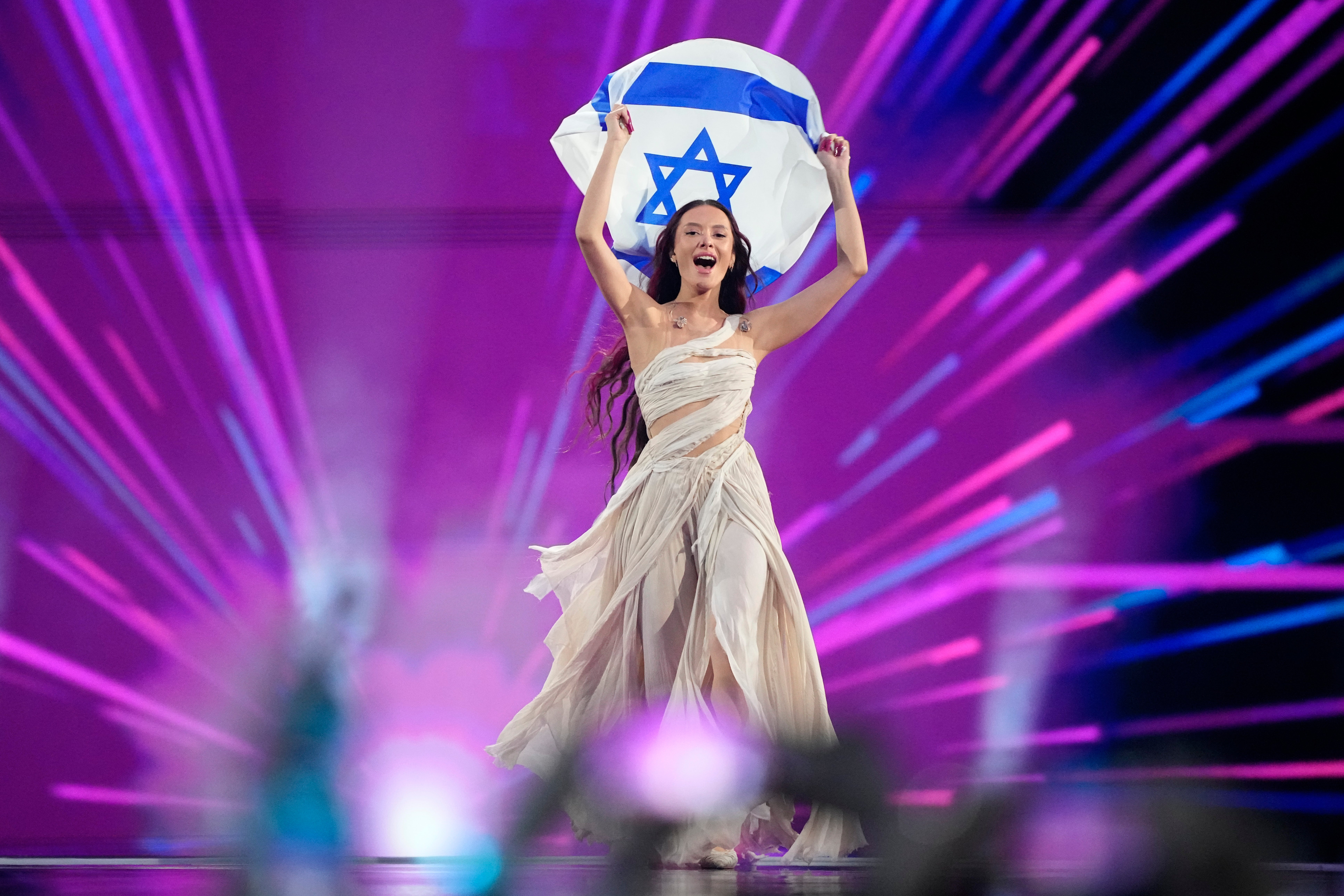Eden Golan of Israel enters the arena during the flag parade before the Grand Final of the Eurovision Song Contest