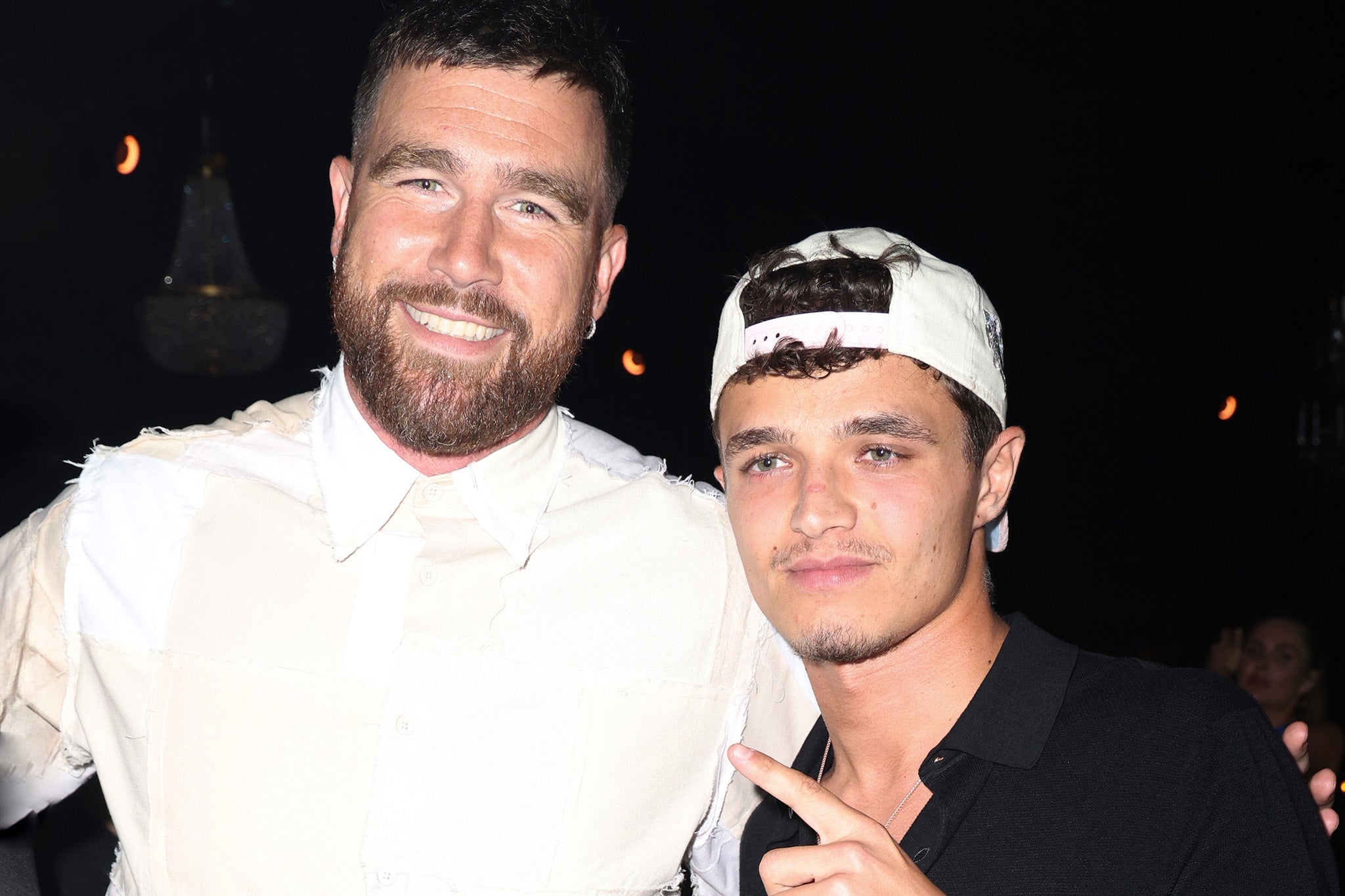 Lando Norris (right) partied with Travis Kelce (left) at Carbone Beach in Miami last week