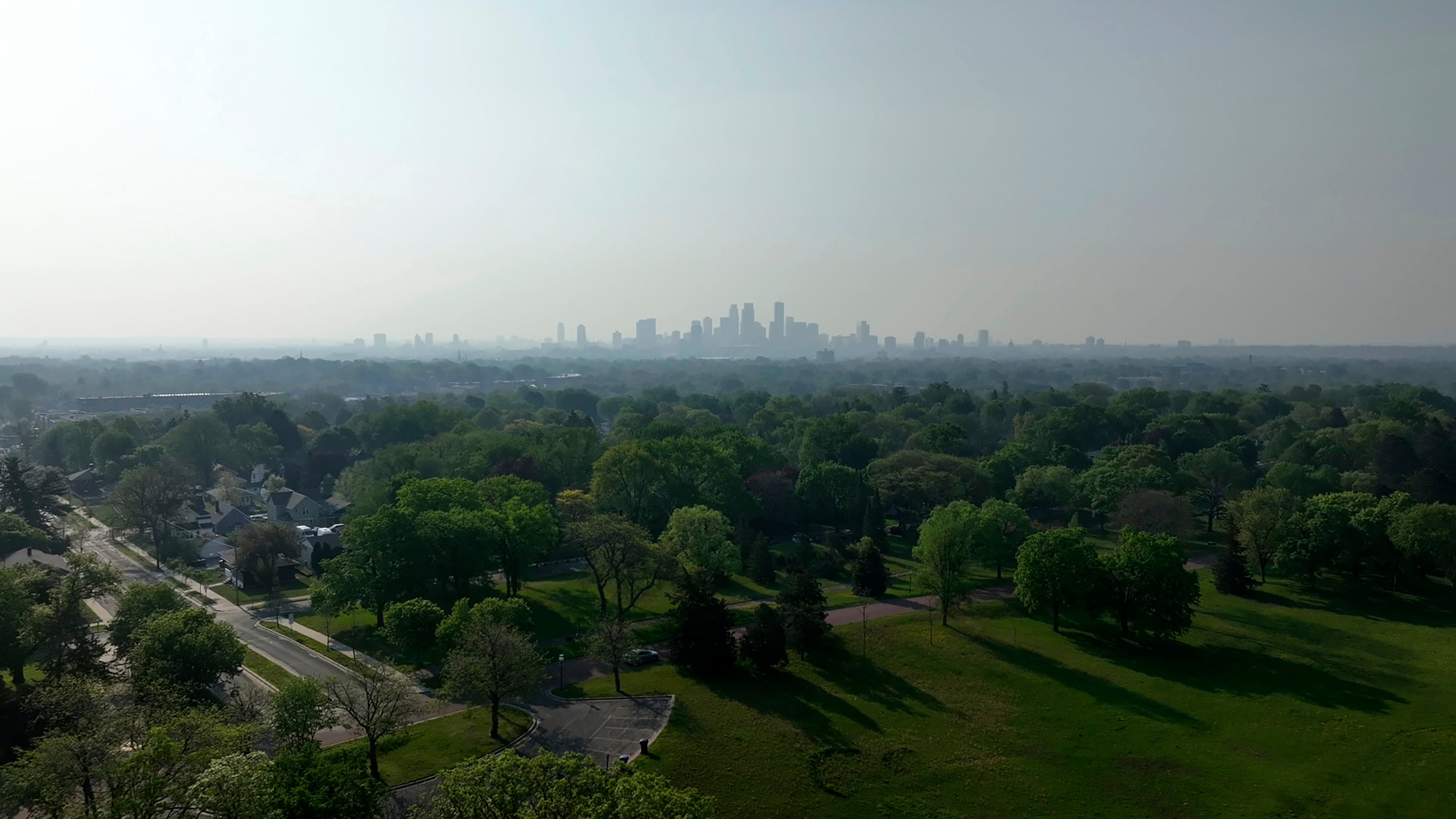 Wildfire smoke hangs over the Minneapolis skyline on May 13, 2024