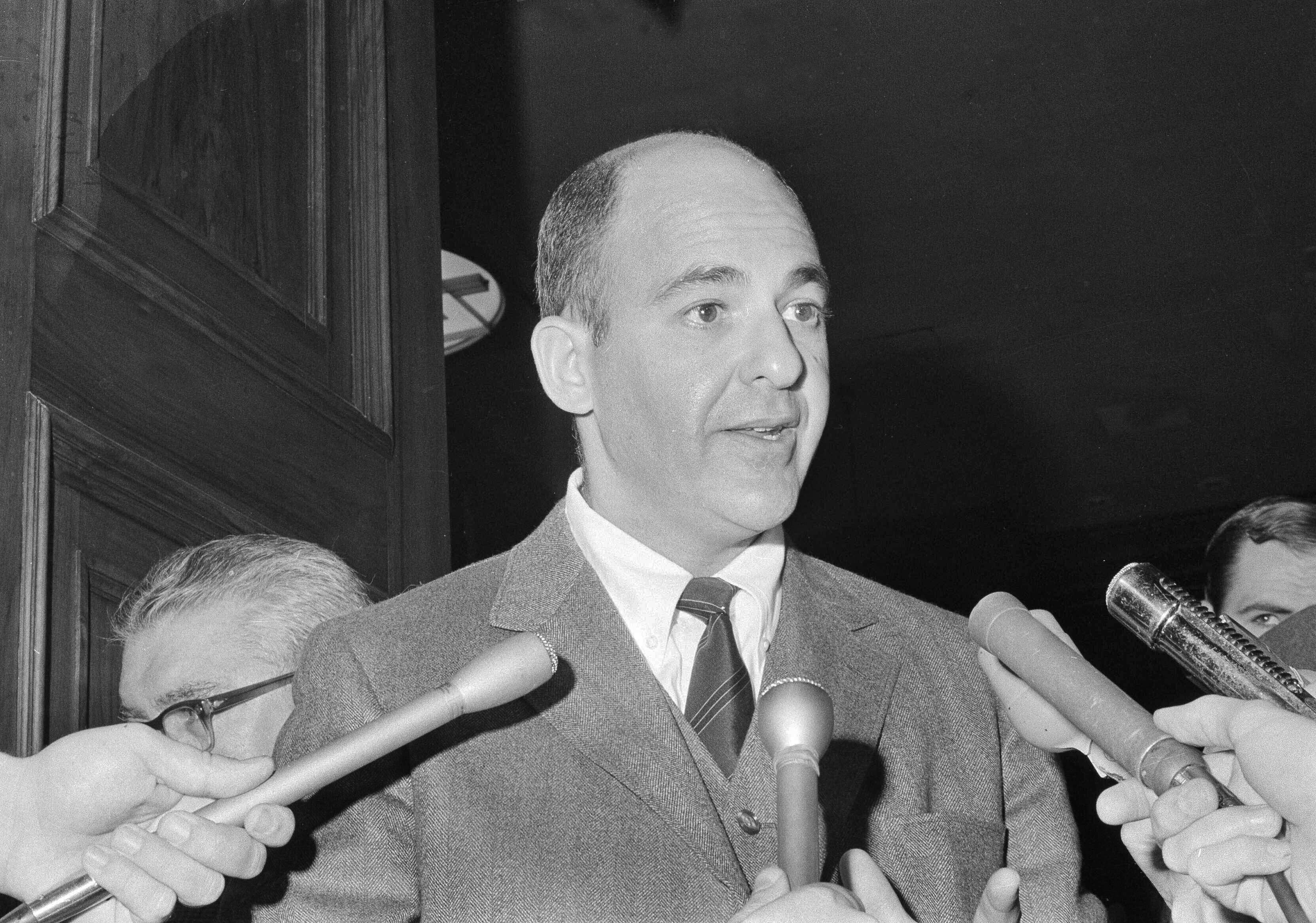Cyril Wecht, pictured in 1969 speaking to reporters, died at 93 years old on Monday