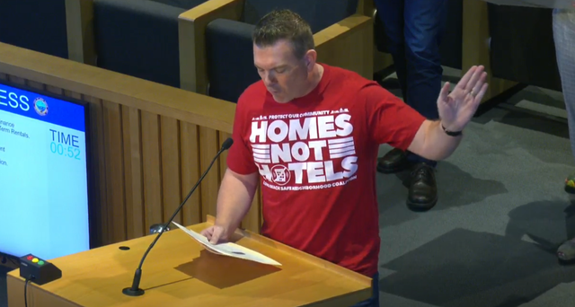 <p>Andy Oliver speaks before the Long Beach City Council before its vote to ban short-term rentals</p>