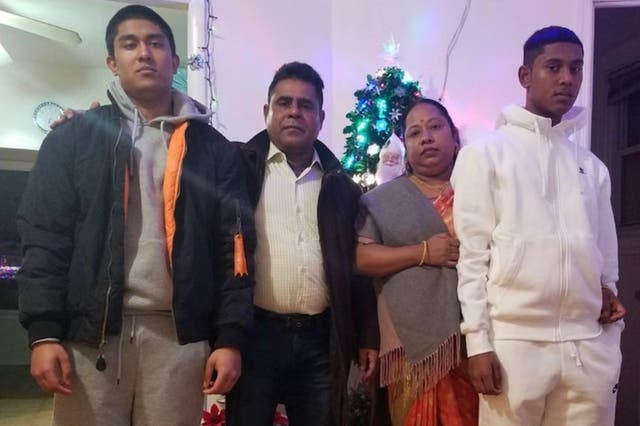 <p>Win Rozario, 19, (far left) with his mother Notan Eva Costa and brother Uthso Rozario. The teen was fatally shot by New York Police Department officers in March</p>