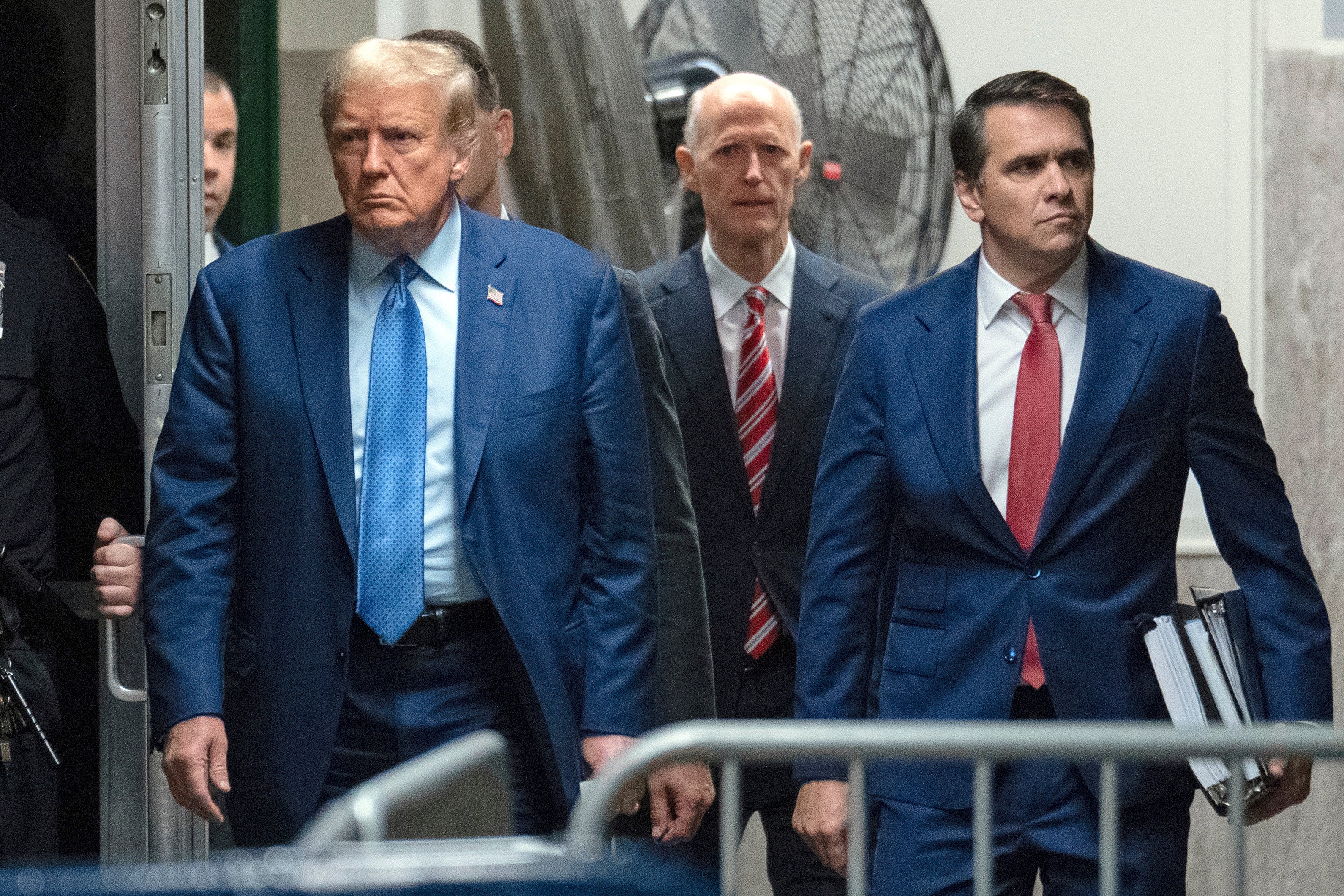 Donald Trump (left), Rick Scott (centre) and attorney Todd Blanche (right) walk into the Manhattan Criminal Court on 9 May. Mr Scott, a GOP senator from Florida, is a staunch ally of the former president