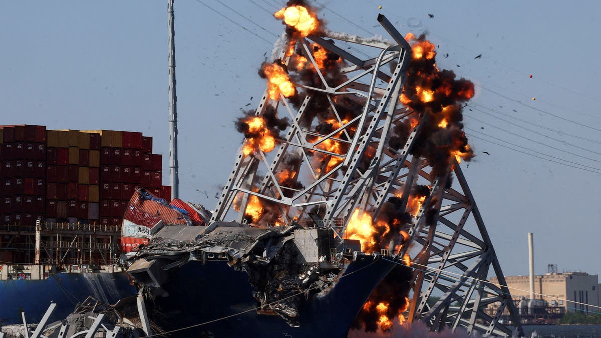 Crews use explosives to demolish Baltimore bridge and free cargo ship