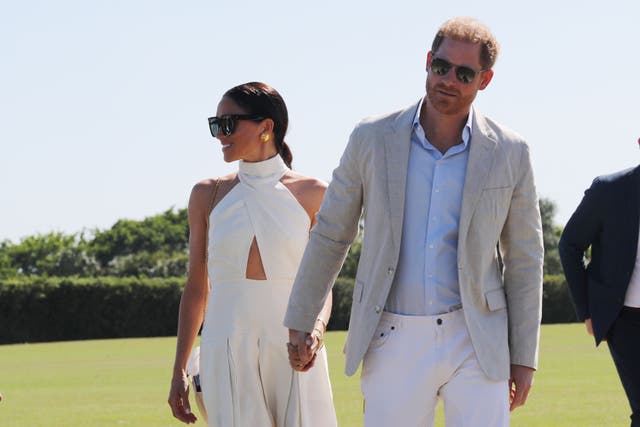 The Duke and Duchess of Sussex at the Royal Salute Polo Challenge, to benefit Sentebale, at The USPA National Polo Center in Wellington, Florida, US. Picture date: Friday April 12, 2024. (Yaroslav Sabitov/PA)