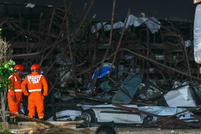 <p>File. Indian rescue workers at the scene of an accident</p>