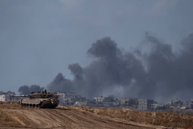<p>An Israeli tank is pictured near the Israeli-Gaza border </p>