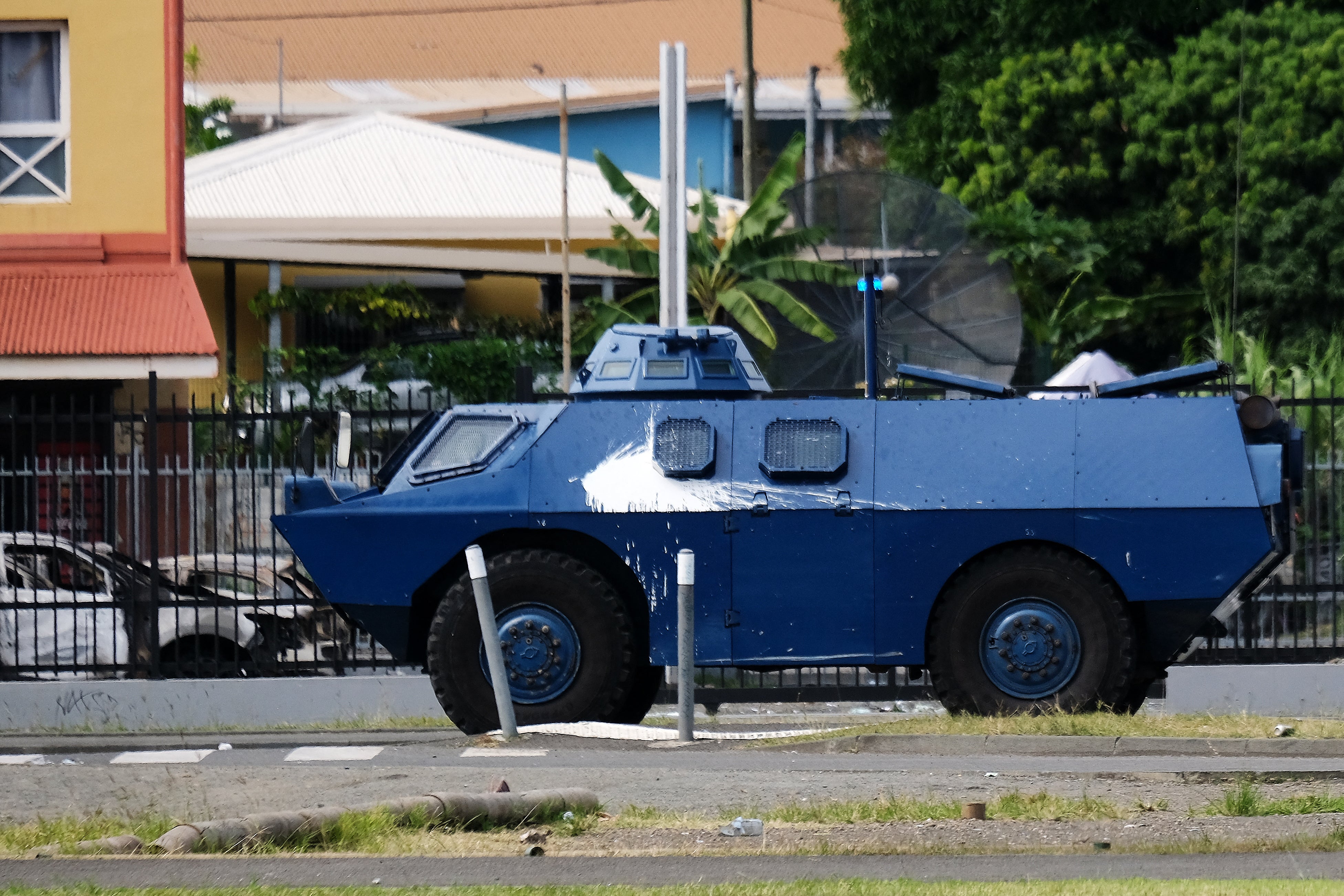 French gendarmerie armored vehicle Berliet VXB-170 (or VBRG) is seen at the entrance of the Vallee-du-Tir district, in Noumea on May 14, 2024