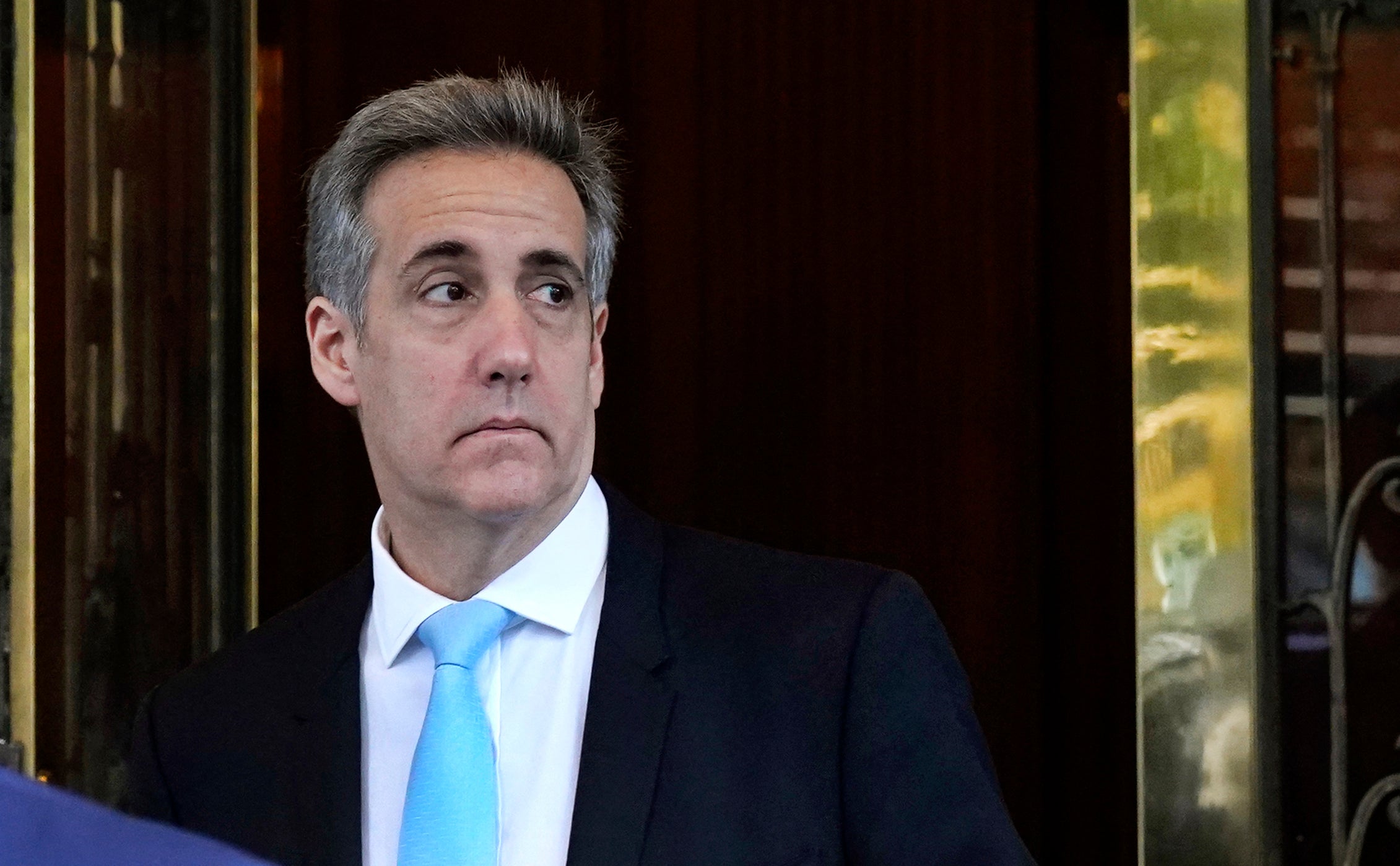 Michael Cohen leaves his home to head to Manhattan Criminal Court for a second day of testimony in Donald Trump’s criminal trial on May 14 2024
