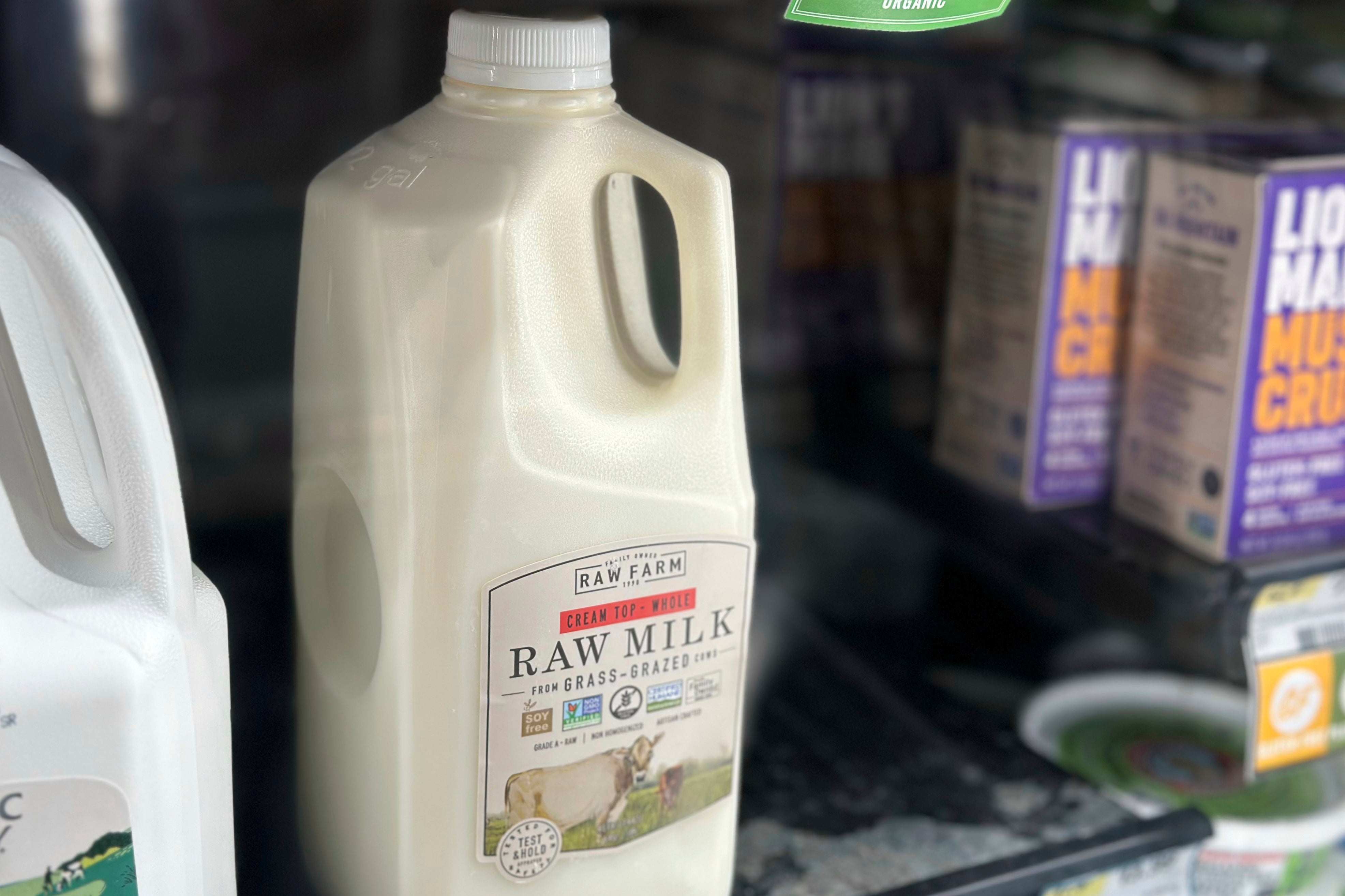 A bottle of raw milk is displayed for sale at a store in Temecula