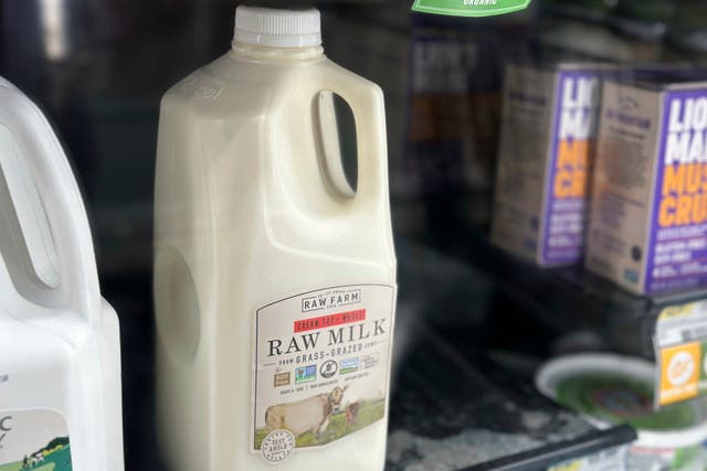<p>A bottle of raw milk is displayed for sale at a store in Temecula</p>