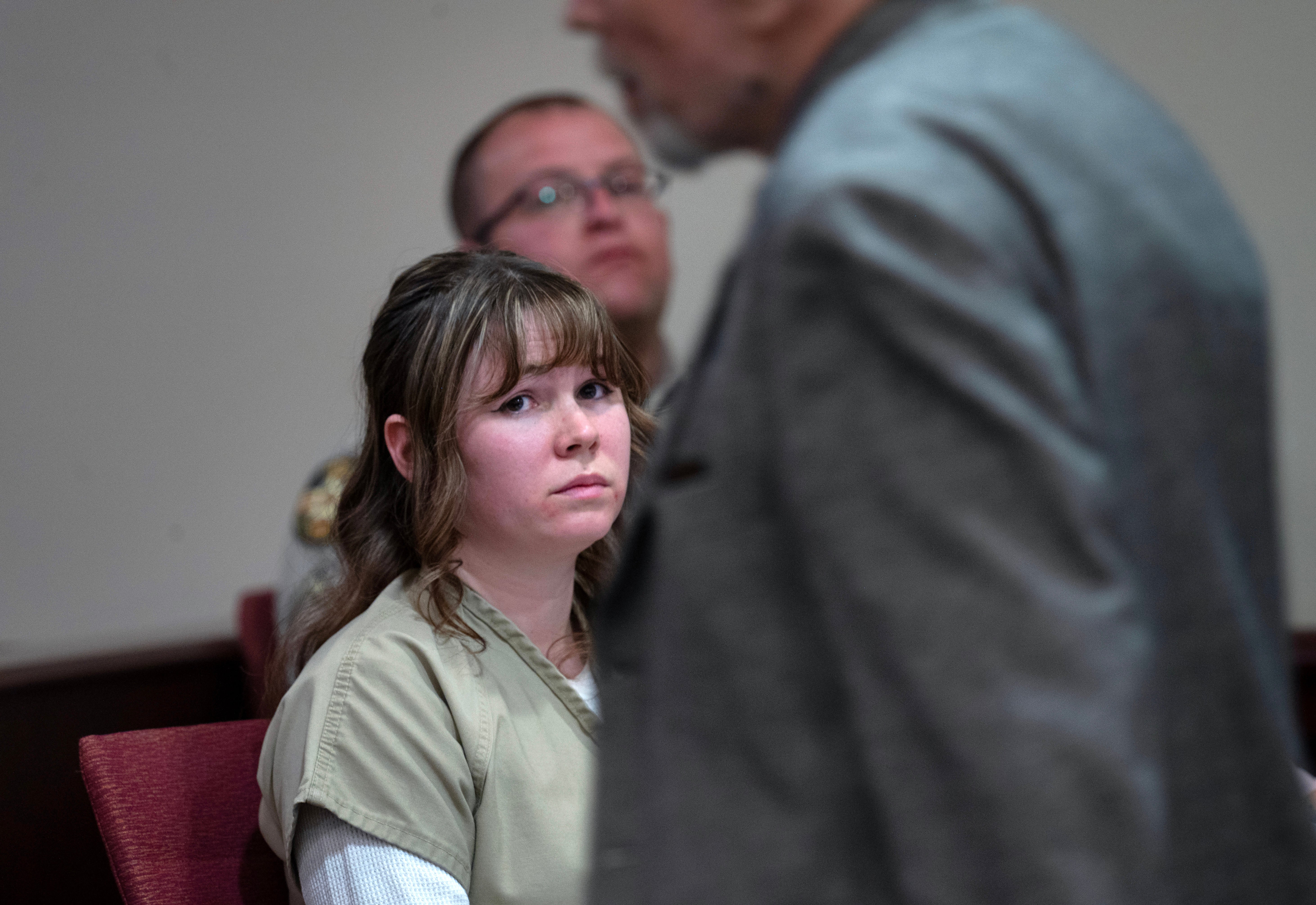 Hannah Gutierrez Reed watches her father Thell Reed leave the podium after he asked the judge not to impose prison time on his daughter in First District Court on 15 April 2024, in Santa Fe, New Mexico