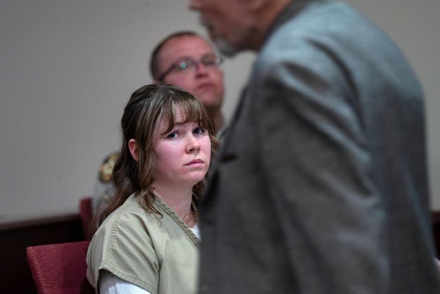 <p>Hannah Gutierrez Reed watches her father Thell Reed leave the podium after he asked the judge not to impose prison time on his daughter in First District Court on 15 April 2024, in Santa Fe, New Mexico</p>