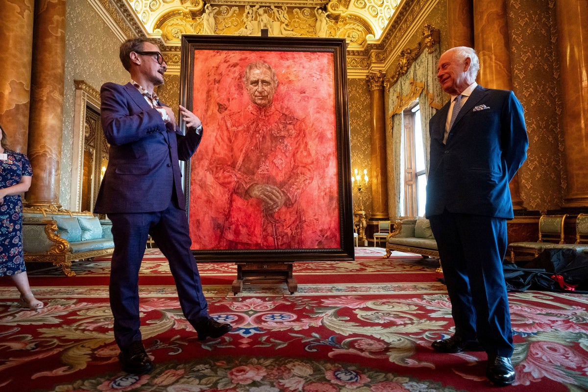 Artist reveals why his portrait of the King is so red
