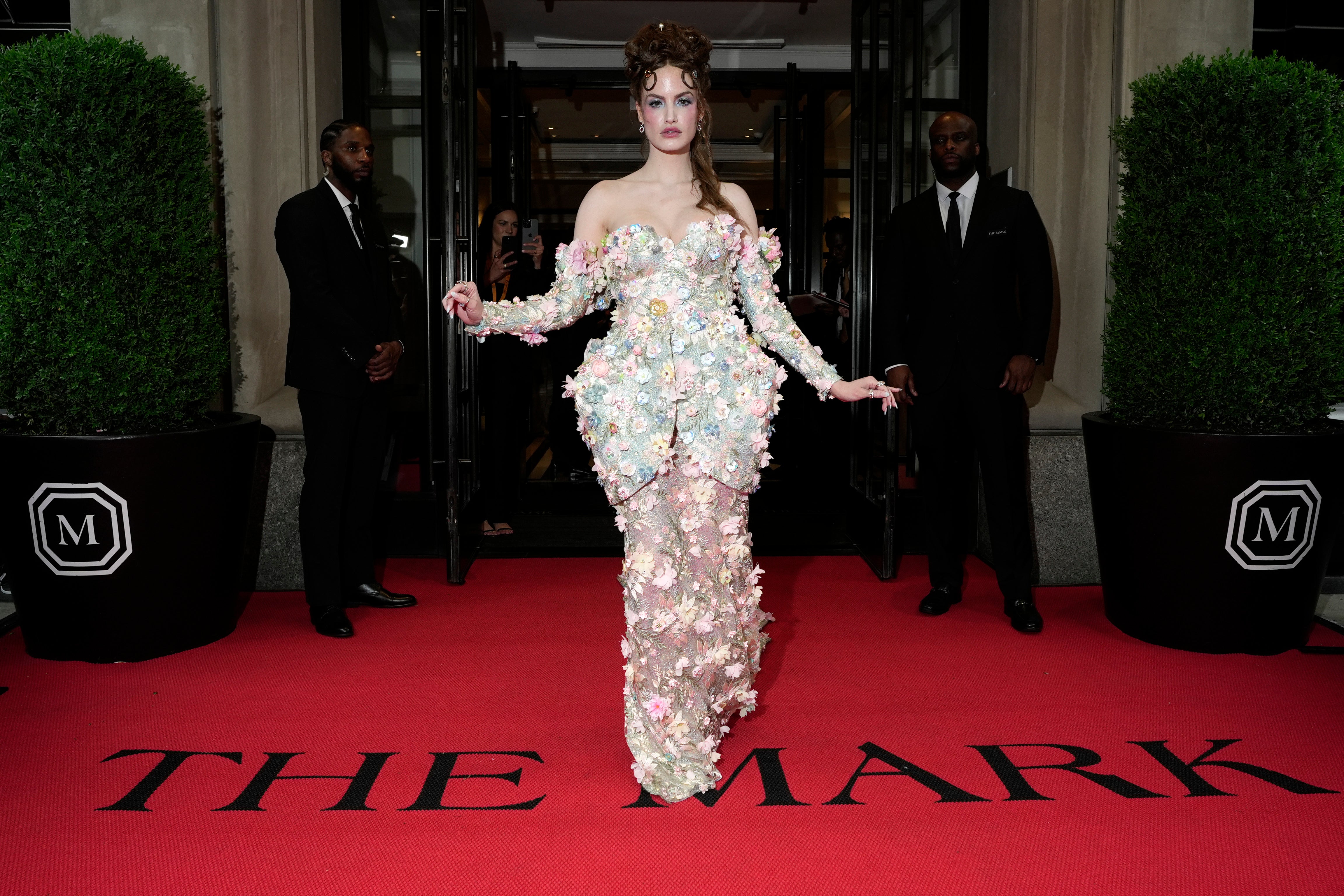 Haley Kalil poses outside The Mark Hotel for the 2024 Met Gala