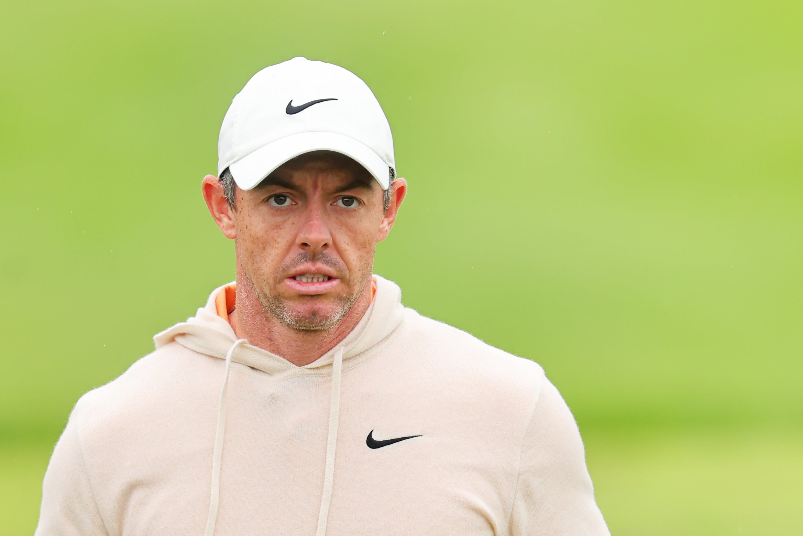Rory McIlroy of Northern Ireland looks on from the driving range during a practice round prior to the 2024 PGA Championship at Valhalla Golf Club on May 14, 2024 in Louisville, Kentucky