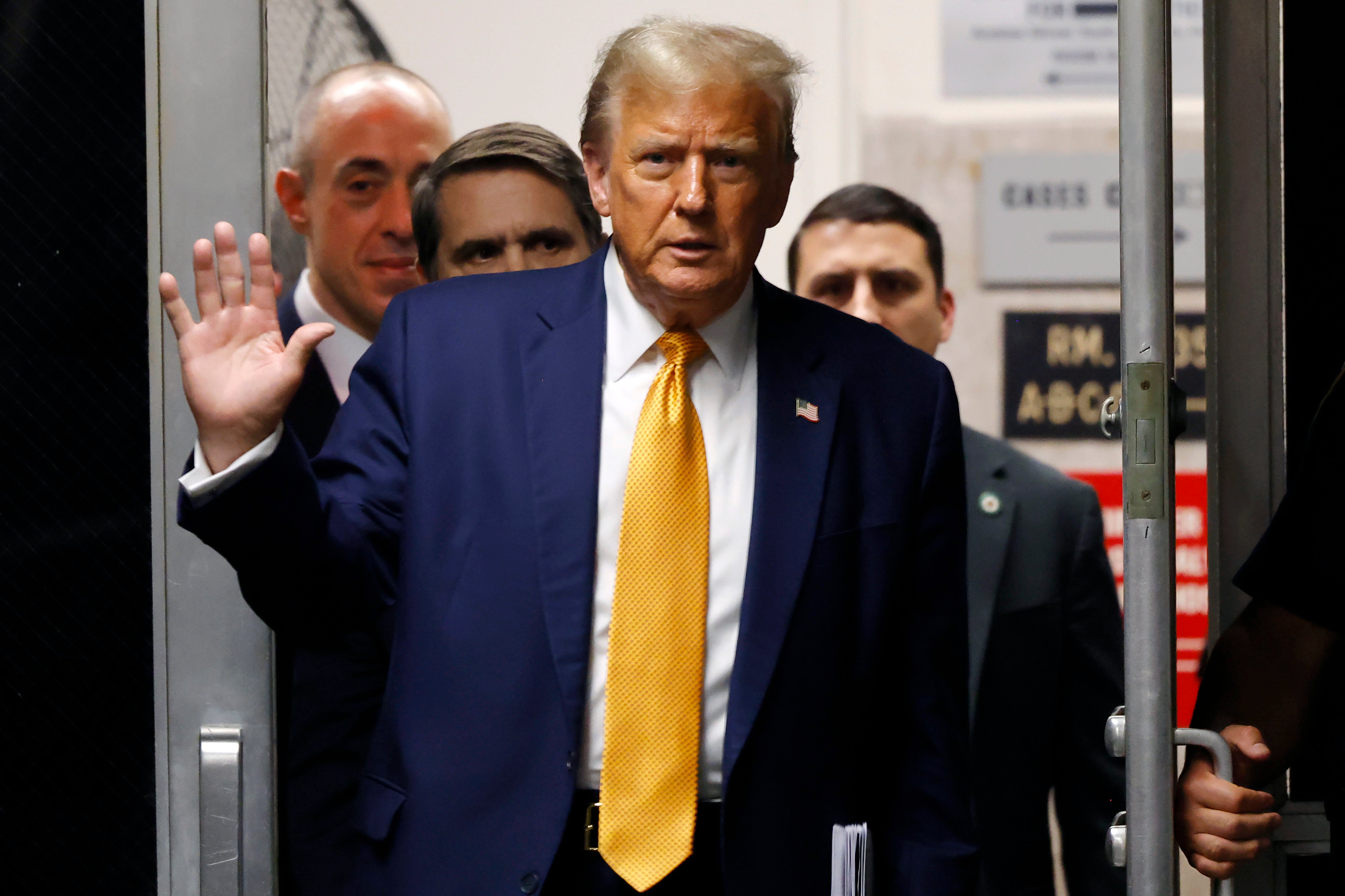 Former President Donald Trump returns to the courtroom after a lunch break during his trial at Manhattan criminal court before his trial in New York