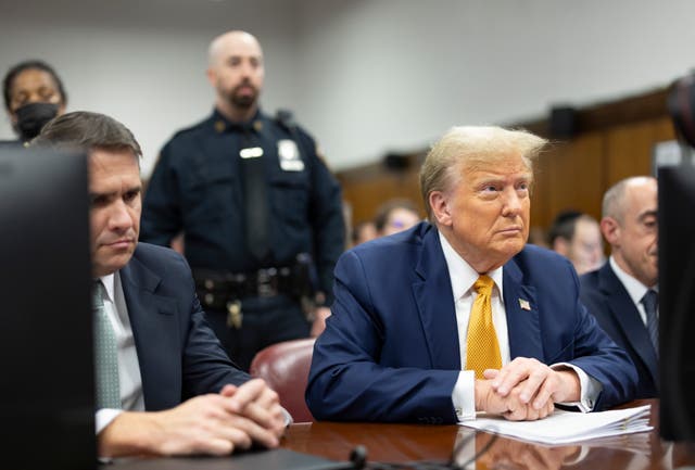 <p>Donald Trump in New York during his hush money trial. Recent polling found that more than half of Americans believe he falsified records to cover up payments to Stormy Daniels </p>
