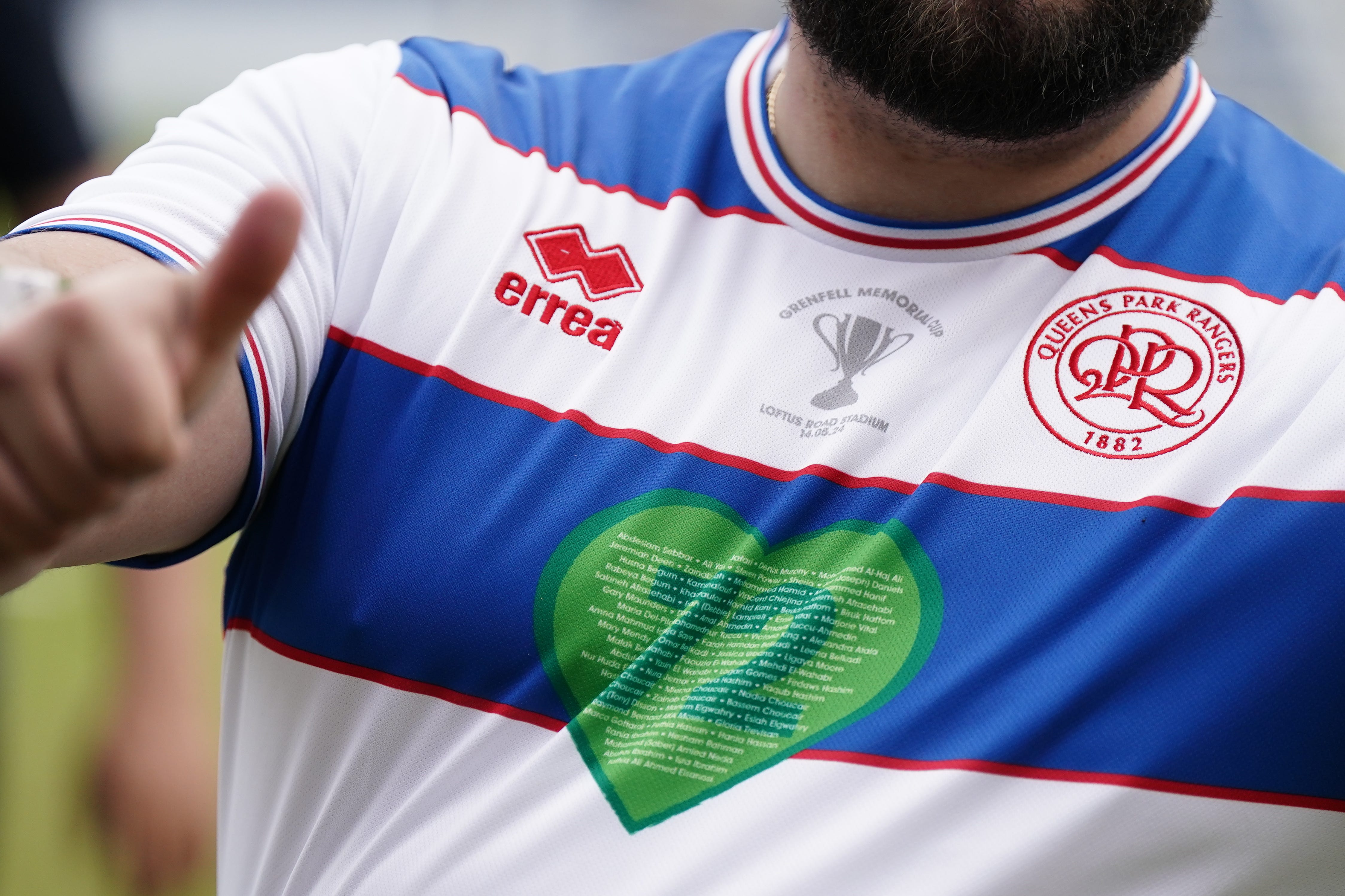 Detail of a player’s shirt during the football match between Grenfell bereaved and survivors, at QPR’s Loftus Road (Aaron Chown/PA)