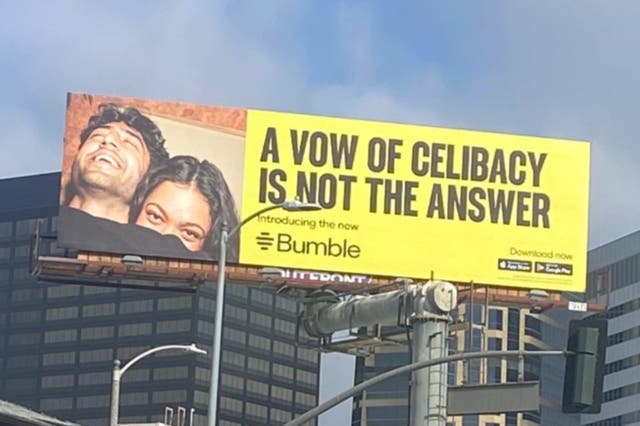 <p>A photo of a Bumble billboard that says, ‘A vow of celibacy is not the answer'</p>