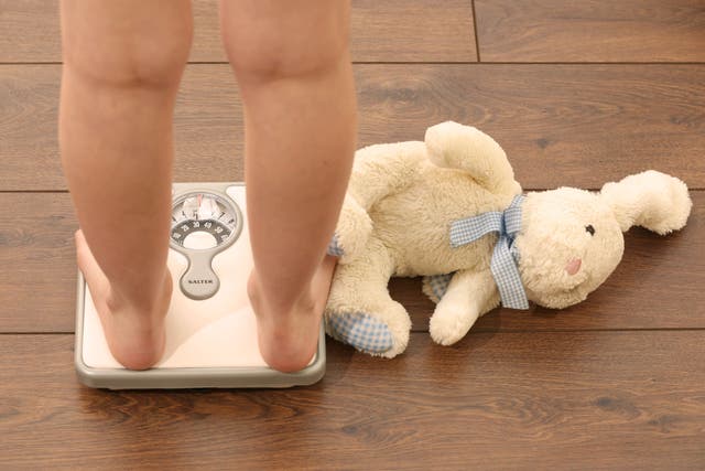 Being very obese as a young child could cut life expectancy by about half, according to a study (Chris Radburn/PA)