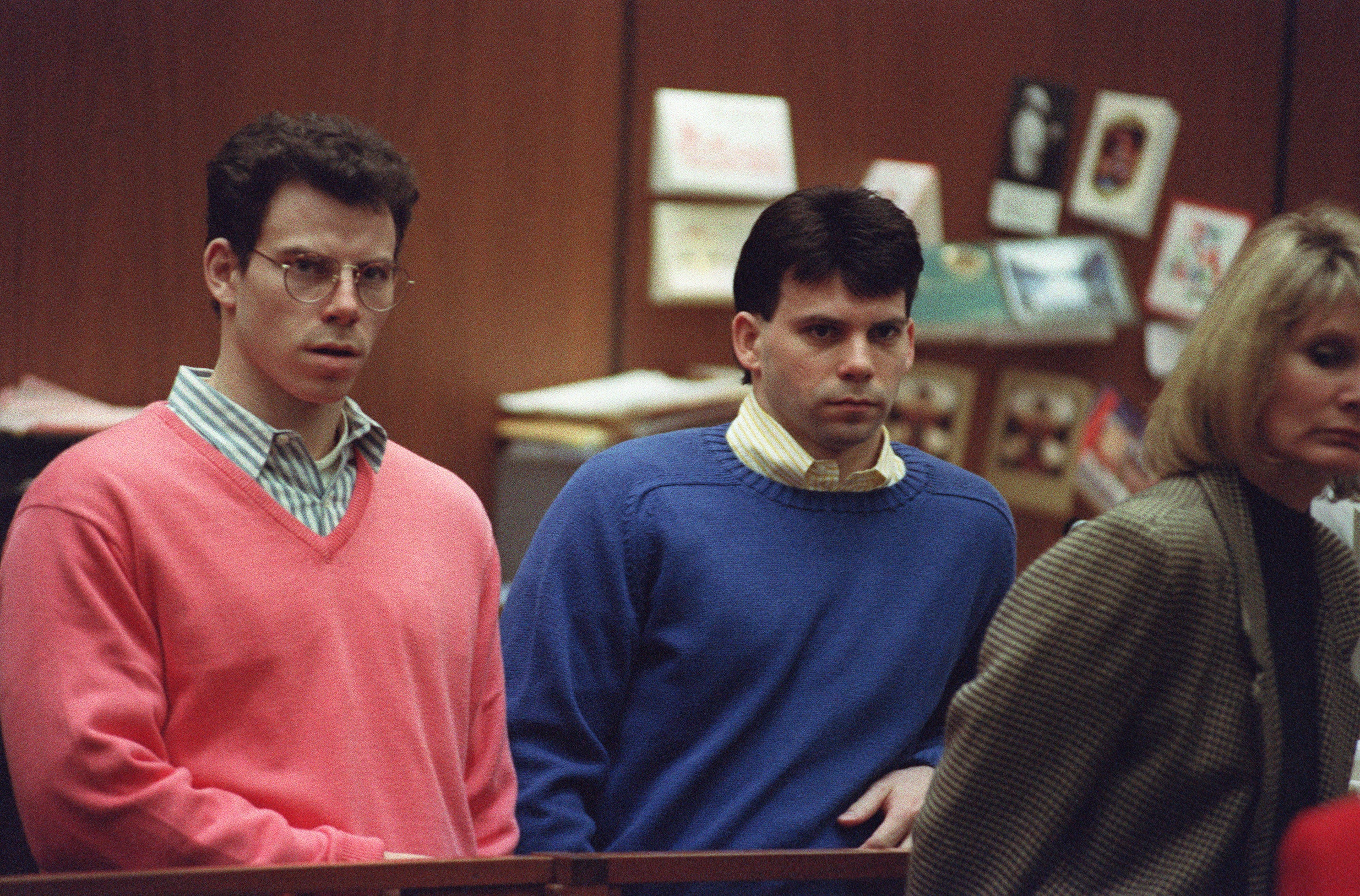 Erik Menendez (L) and his brother Lyle (R) listen during a pre-trial hearing, on December 29, 1992 in Los Angeles after the two pleaded innocent in the August 1989 shotgun deaths of their wealthy parents, Jose and Mary Louise Menendez of Beverly Hills, California