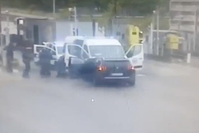 <p>France prison convoy attack: Gunmen wearing balaclavas ambush a prison van to free a drug dealer in Val-de-Reuil</p>