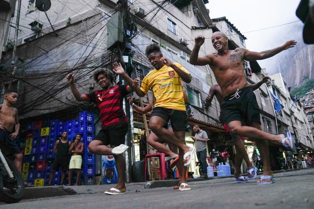 <p>Youth perform a street dance style known as passinho for their social media accounts </p>