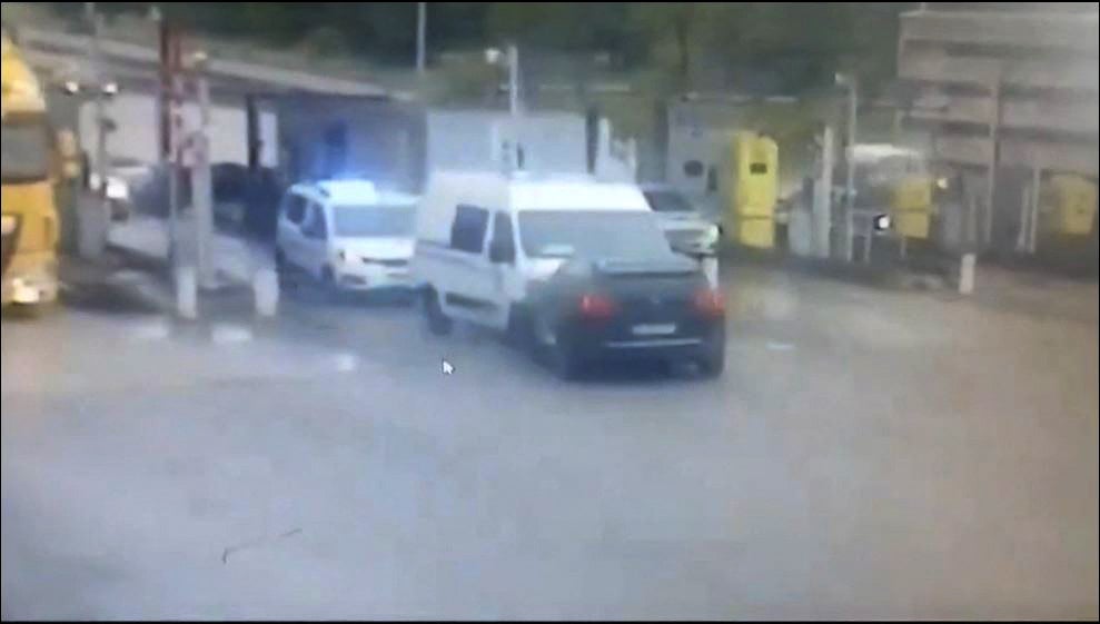 The black Peugeot rammed into the front of the prison van, bringing it to a stop with Amra inside