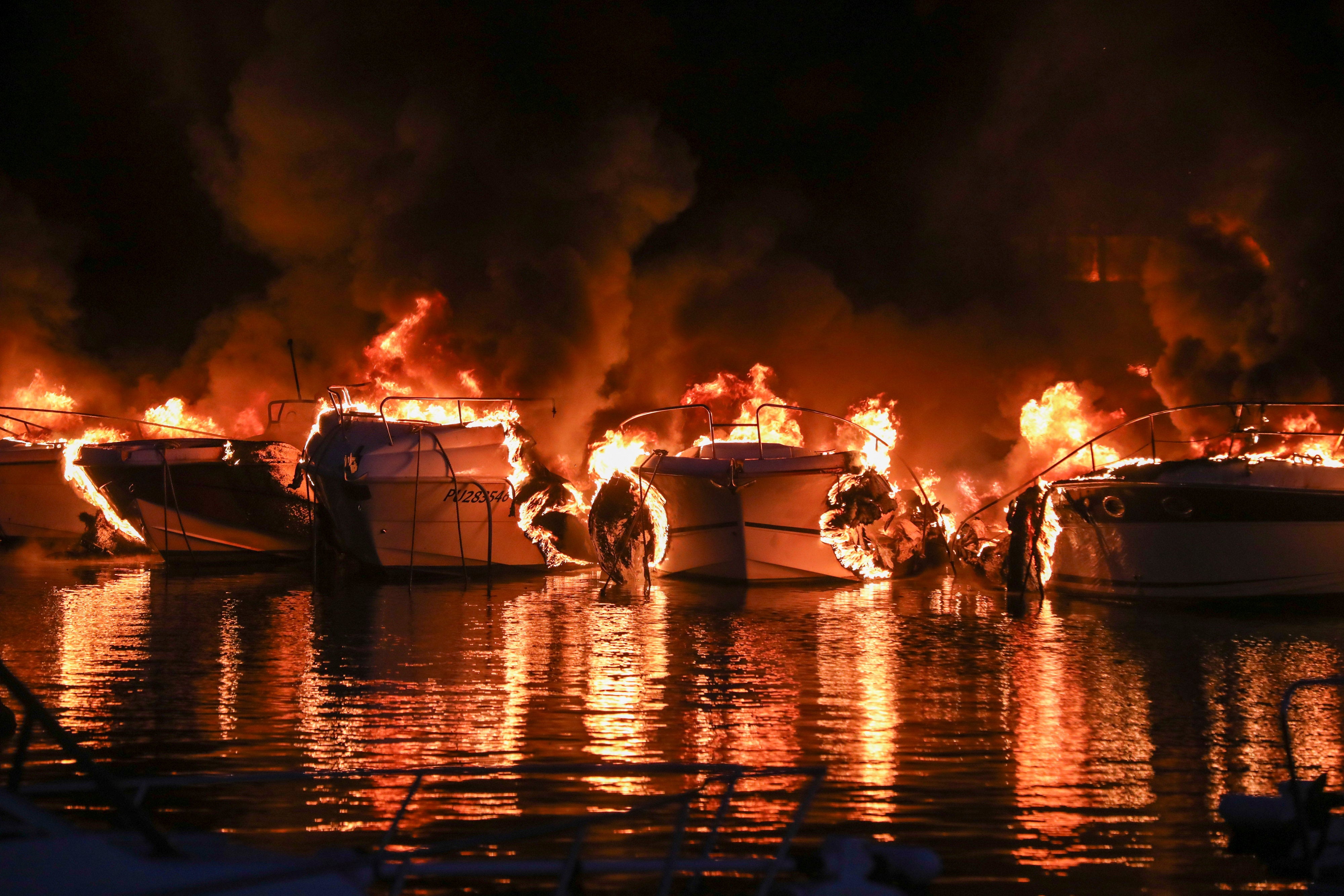 Boats are on fire in Medulin, Croatia, early Wednesday, May 15, 2024
