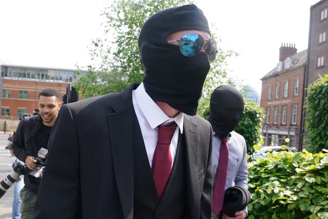 <p>Daniel Graham (left) and Adam Carruthers leaving Newcastle Upon Tyne Magistrates' Court after appearing in connection with the felling of the Sycamore Gap tree</p>