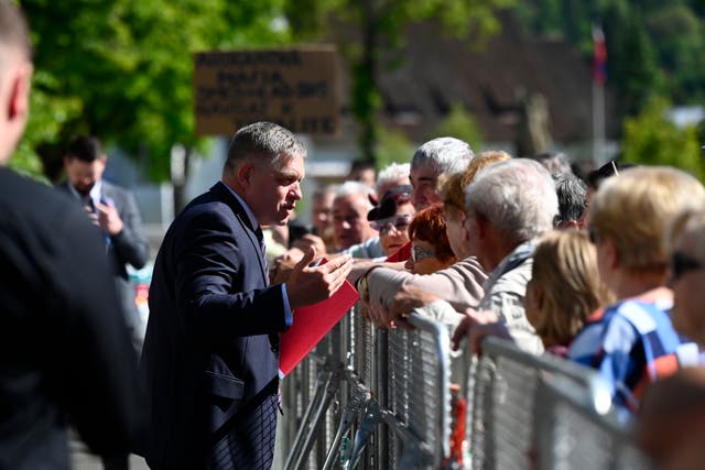 <p>Slovakian prime minister Robert Fico is seen greeting members of the public in Handlova just minutes before being shot  </p>
