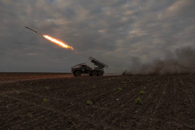 <p>Ukrainian servicemen of the 92nd Assault Brigade fire BM-21 'Grad' multiple rocket launcher toward Russian positions, in the Kharkiv region</p>