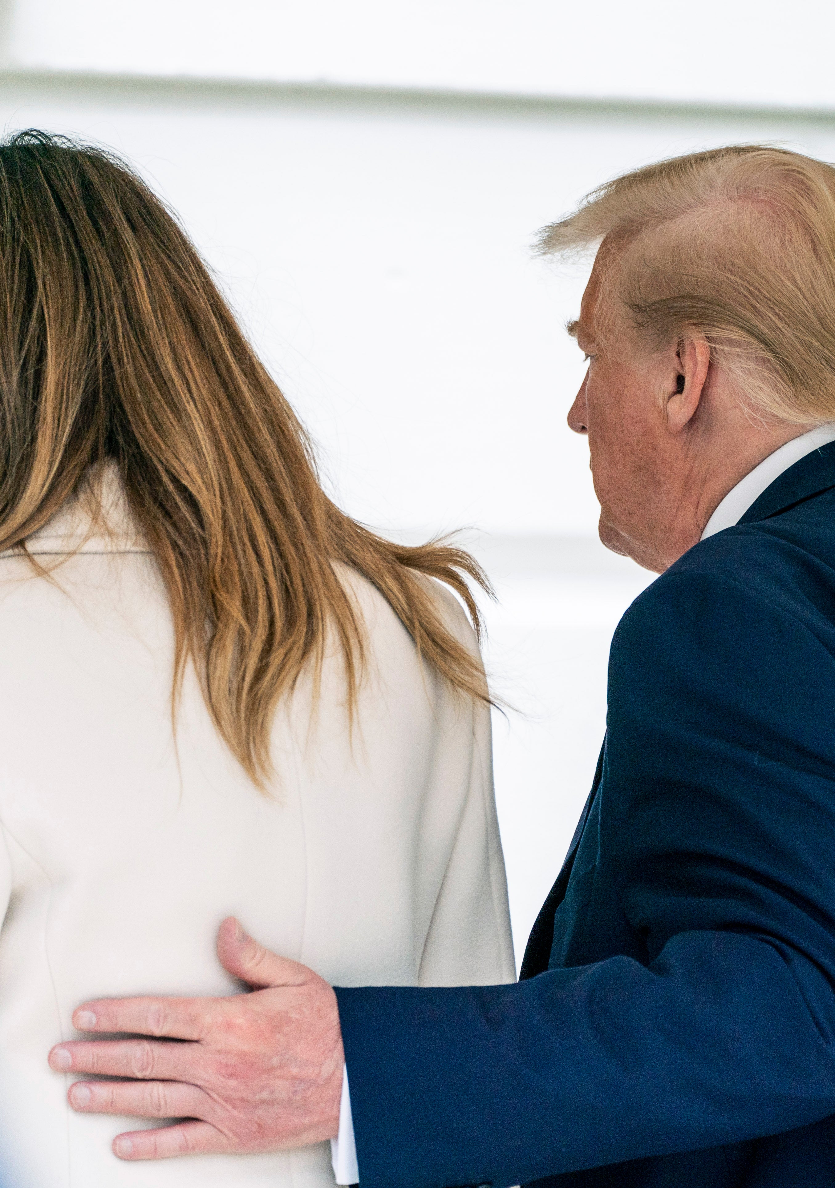 Then-US president Donald Trump and first lady Melania Trump arrive to the White House after a trip to Baltimore, Maryland, on 25 May 2020