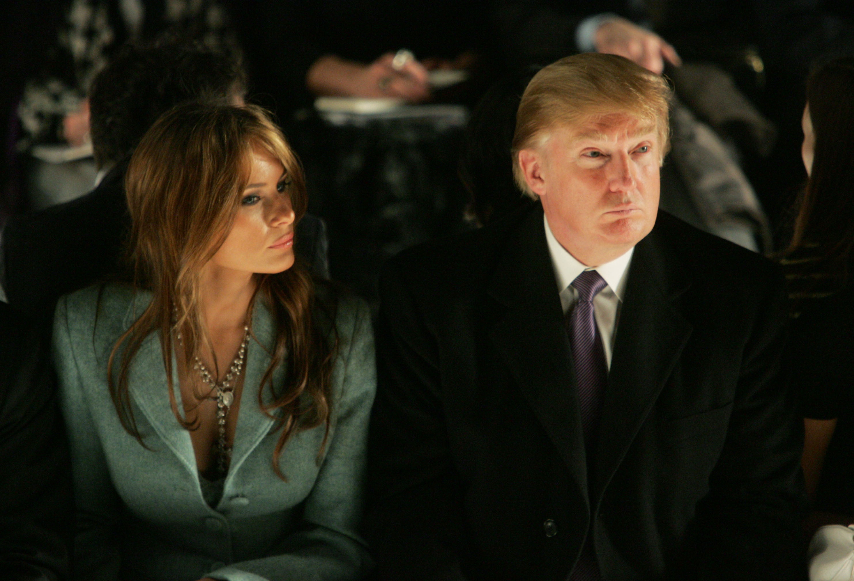 Donald and Melania Trump attend the Michael Kors show during Olympus Fashion Week at Bryant Park in New York on 9 February 2005