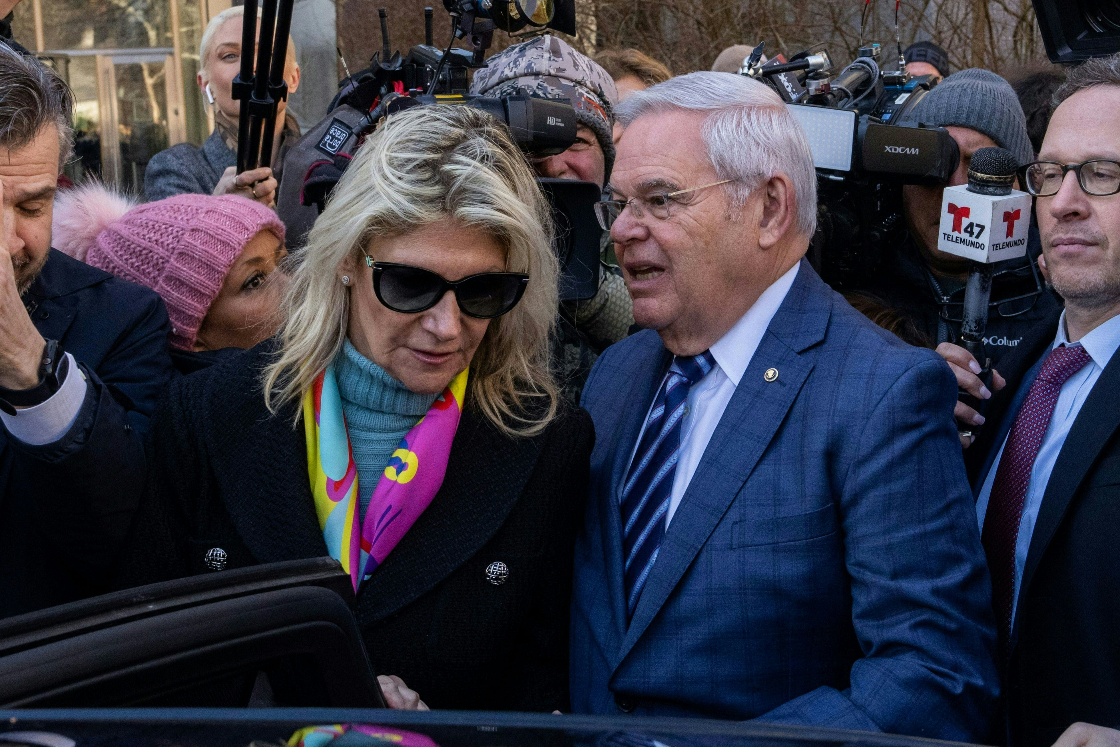 US Senator Bob Menendez (center right), Democrat of New Jersey, leaves with his wife Nadine Menendez the Manhattan Federal Court, in New York City following his arraignment on March 11, 2024