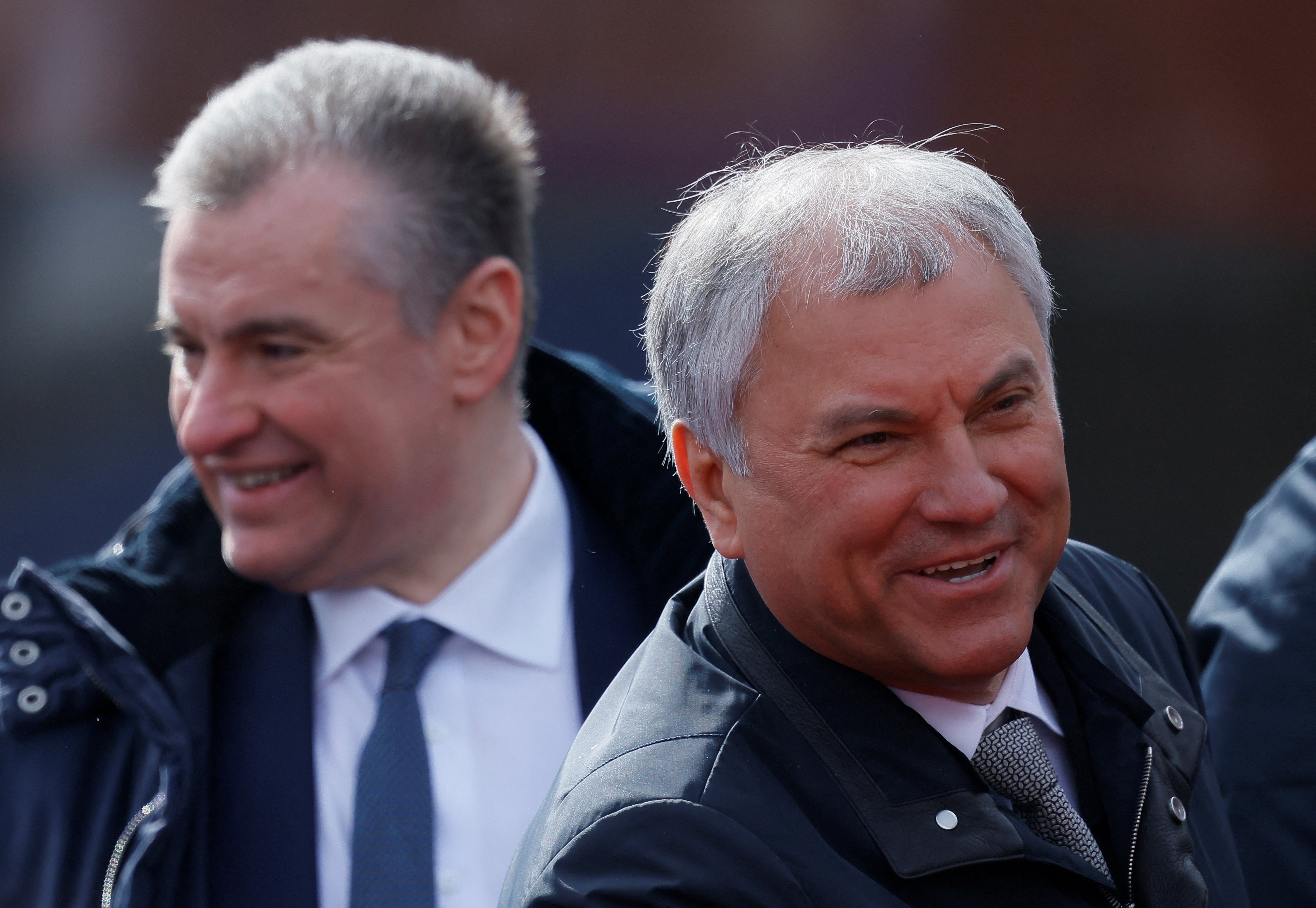 Speaker of Russia’s State Duma lower house of parliament Vyacheslav Volodin (R) and Leonid Slutsky, leader of the Liberal Democratic Party of Russia (LDPR), attend a military parade on Victory Day,