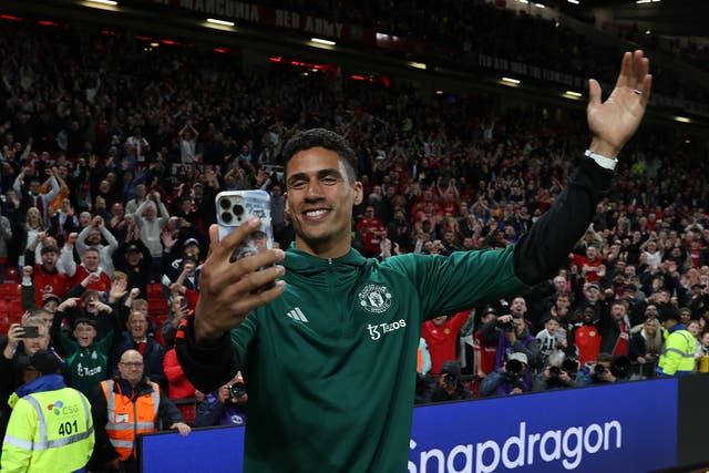 <p>Raphael Varane of Manchester United says goodbye to the fans</p>