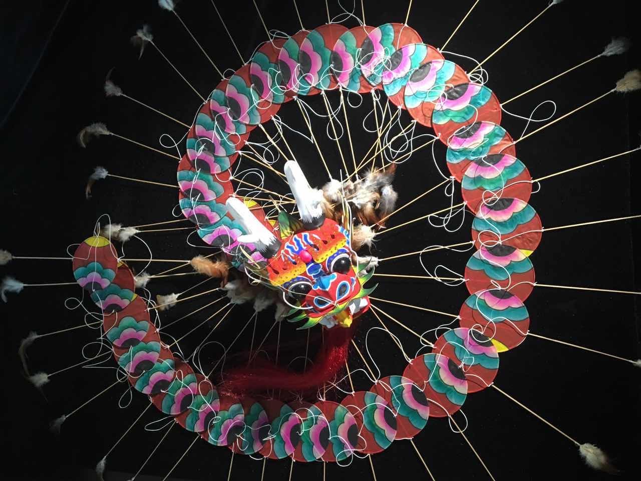 A dragon-headed centipede kite made by Yang Hongwei, a national-level representative inheritor of kite-making techniques in Weifang, Shandong province