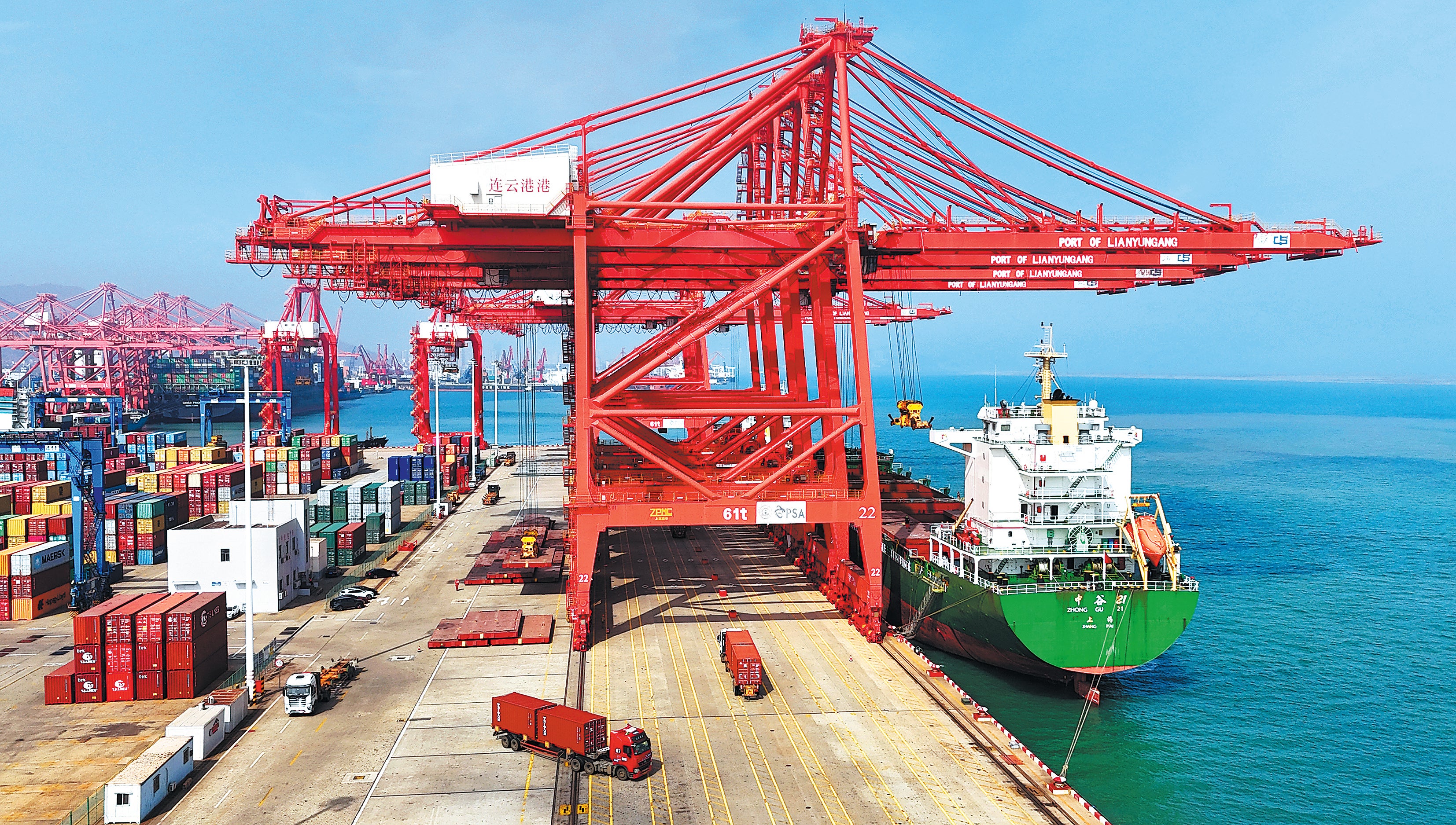 A container vessel busy loading in Lianyungang, Jiangsu province