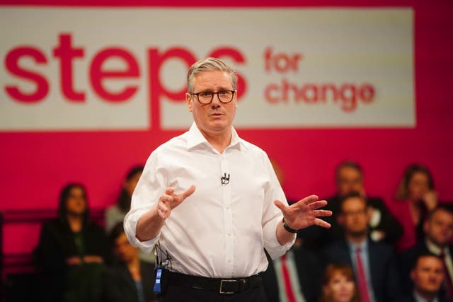 Labour Party leader Sir Keir Starmer speaks during his visit to the Backstage Centre, Purfleet, for the launch of Labour’s doorstep offer to voters ahead of the general election (Victoria Jones/PA)