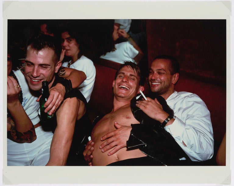 ‘Clemens, Jens and Nicolas Laughing at Le Pulp, Paris’ by Nan Goldin, 1999
