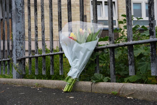 Floral tribute left near to the scene in Plaistow (Jordan Pettitt/PA)