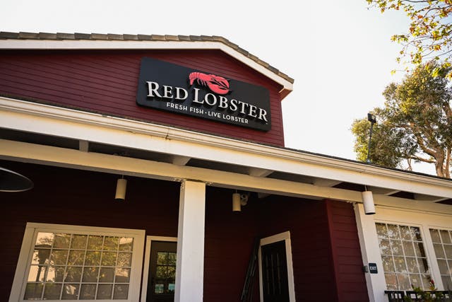 <p>American seafood chain Red Lobster, pictured above in Torrance, California, is closing down several locations and auctioning off equipment</p>