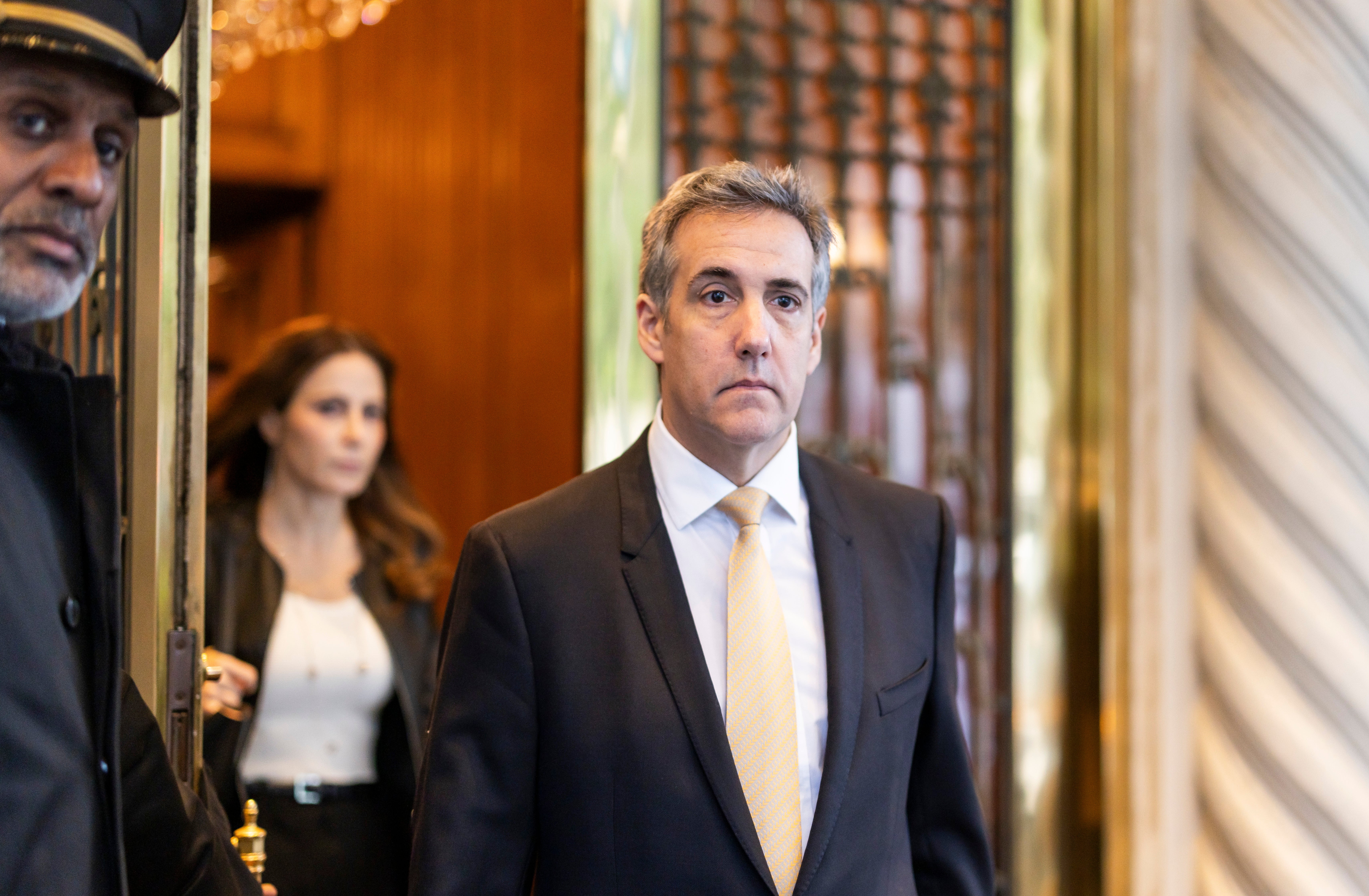 Trump's former lawyer Michael Cohen leaves his apartment building on his way to testify in former US president Donald Trump’s ongoing criminal trial at New York State Supreme Court in New York this week