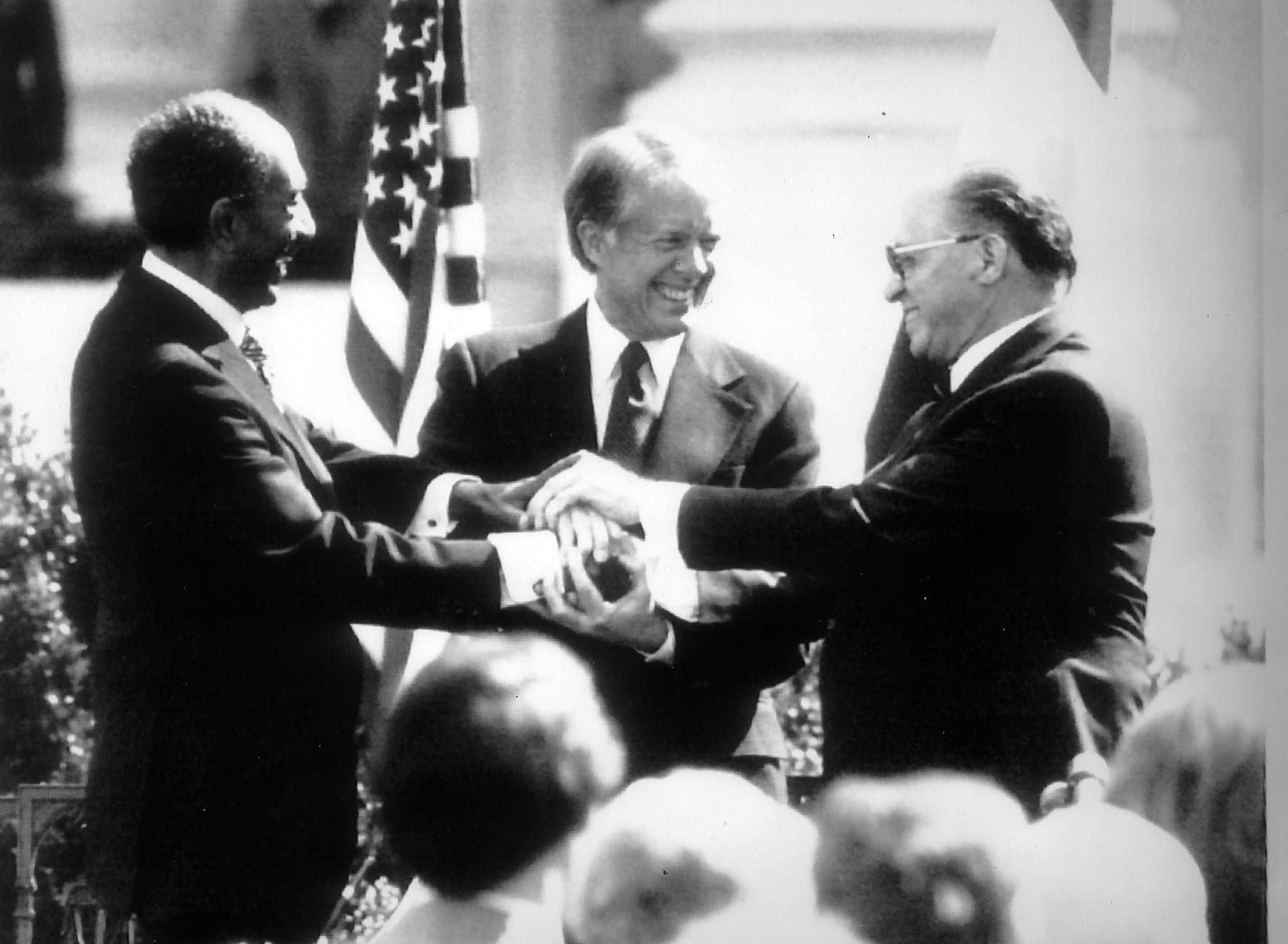 Former president Jimmy Carter with President Menachem Begin and Anwar Sadat after the signing of a peace treaty between Israel and Egypt