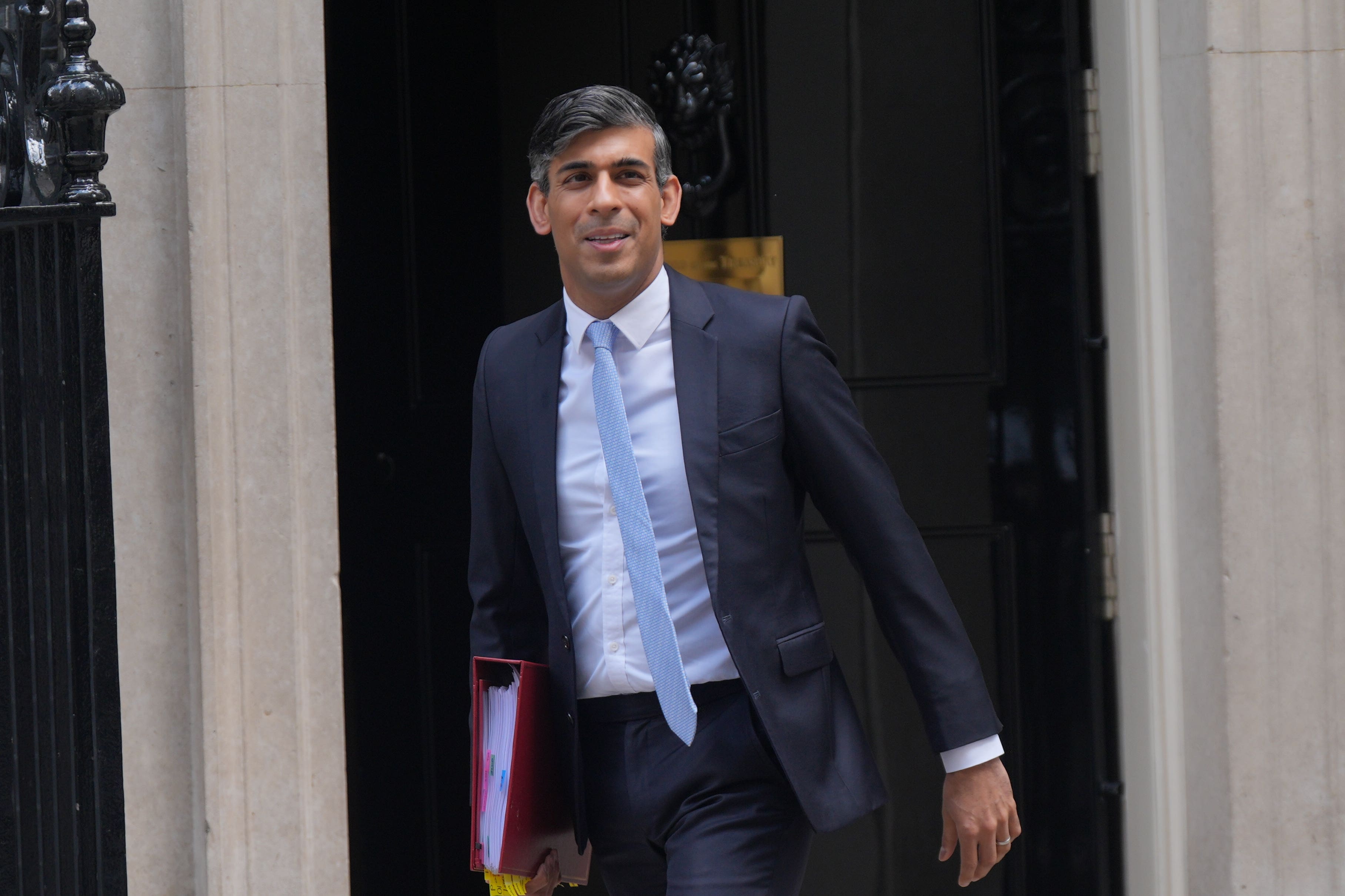 Prime minister Rishi Sunak steps out of 10 Downing Street. The UK was marked down for weak leadership