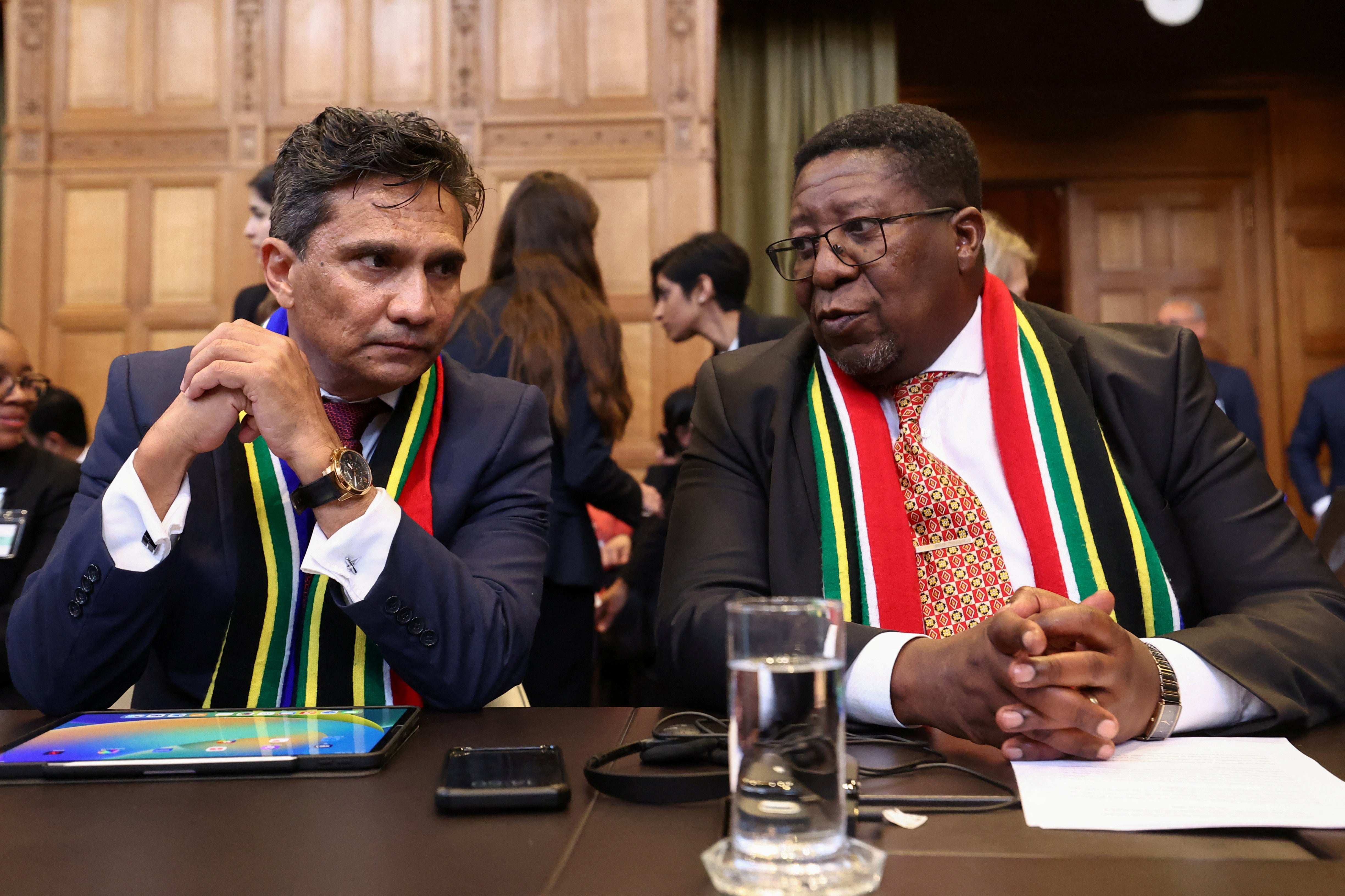 Director-General of the Department of International Relations and Cooperation of the Republic of South Africa Zane Dangor and South African Ambassador to the Netherlands Vusimuzi Madonsela look on at the International Court of Justice (ICJ)