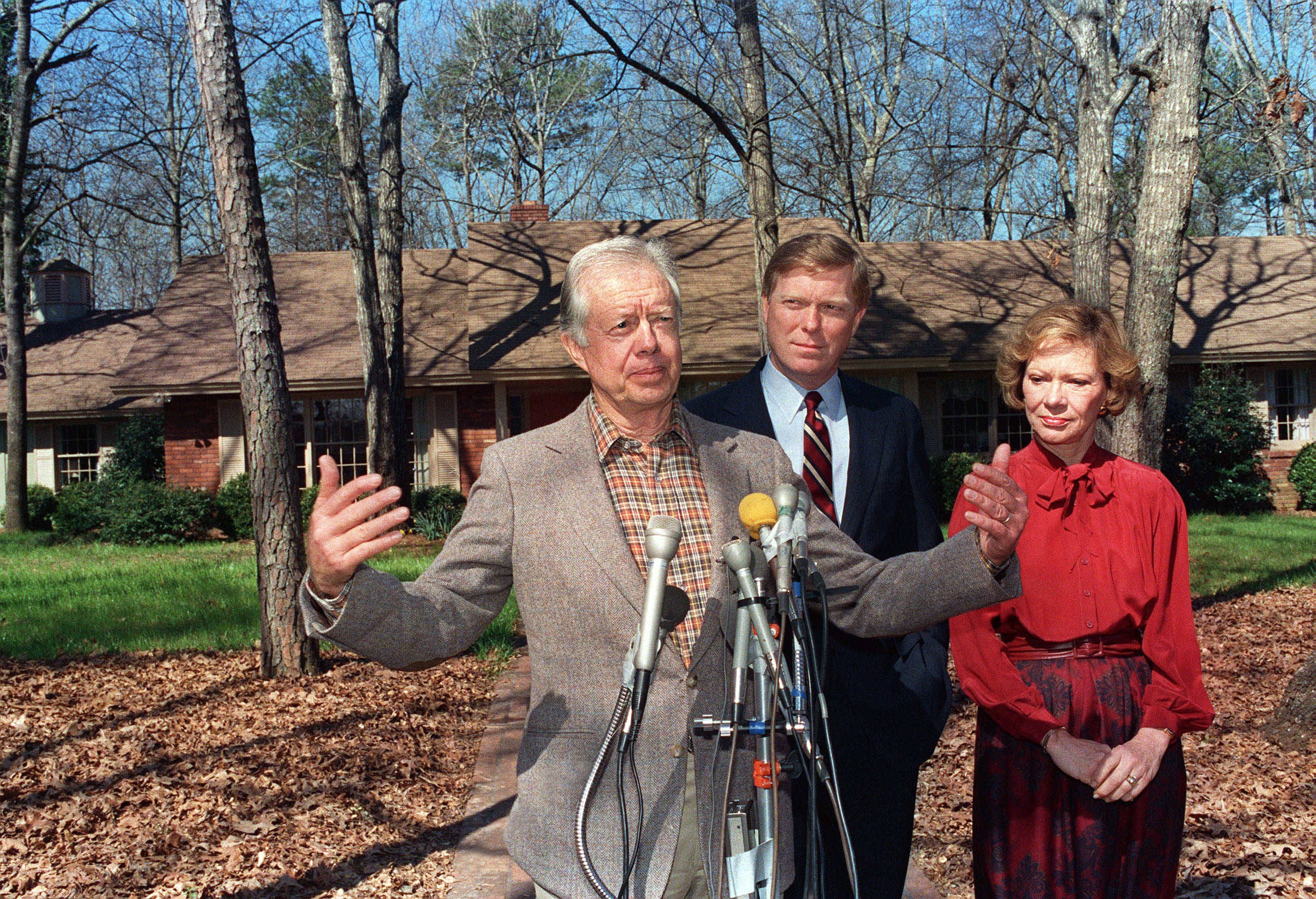 Jimmy Carter (left) pictured with his wife Rosalynn Carter (right) outside their Plains, Georgia home in 1988. The Carters lived in a home valued at just $167,000 after they left the White House, the Washington Post reports