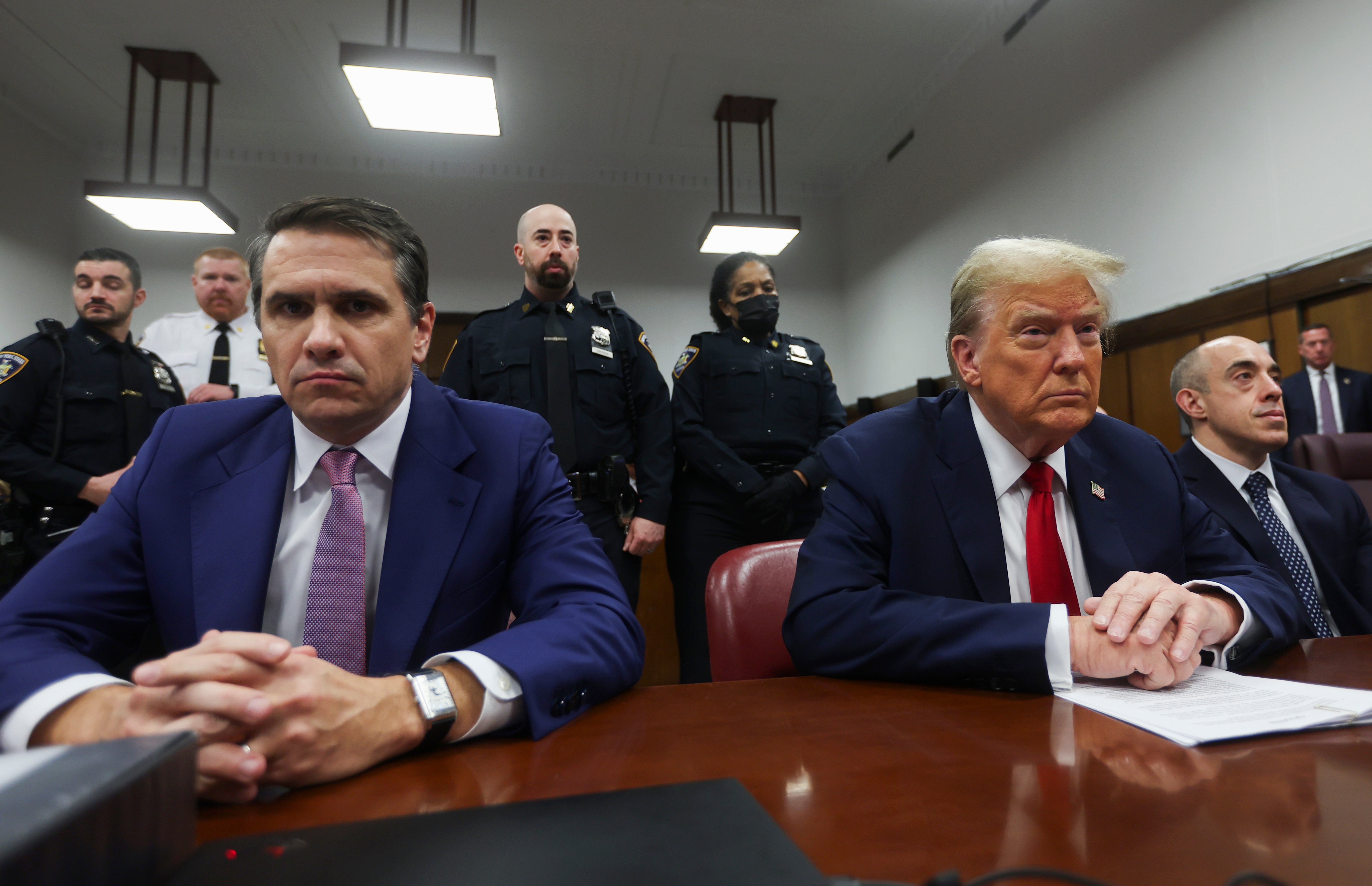 Defense attorney Todd Blanch sits next to his client Donald Trump before his hush money trial proceedings begin on 16 May.